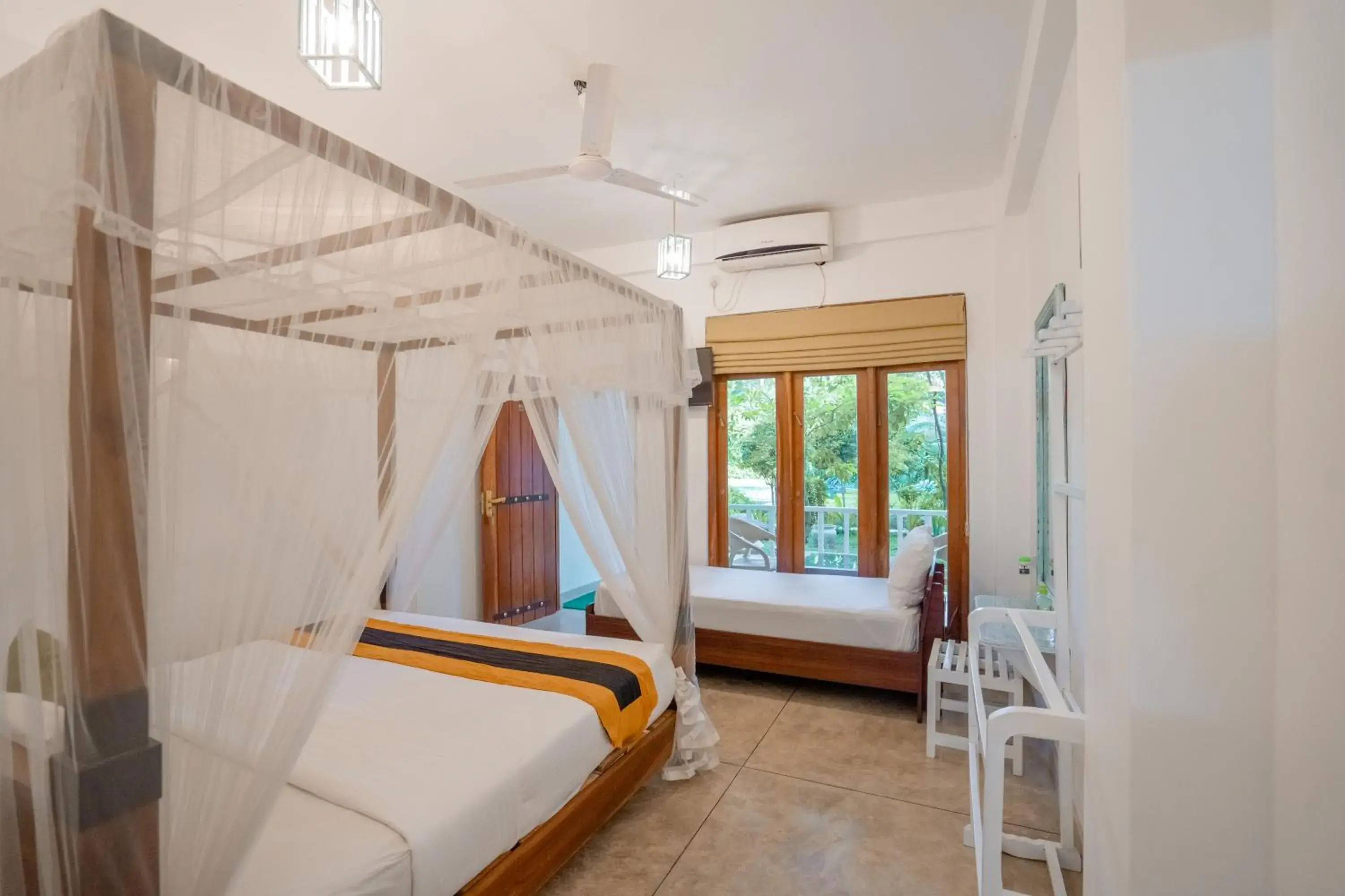 Deluxe Triple Room in French Garden Kandy Deluxe Triple Room in French Garden Kandy