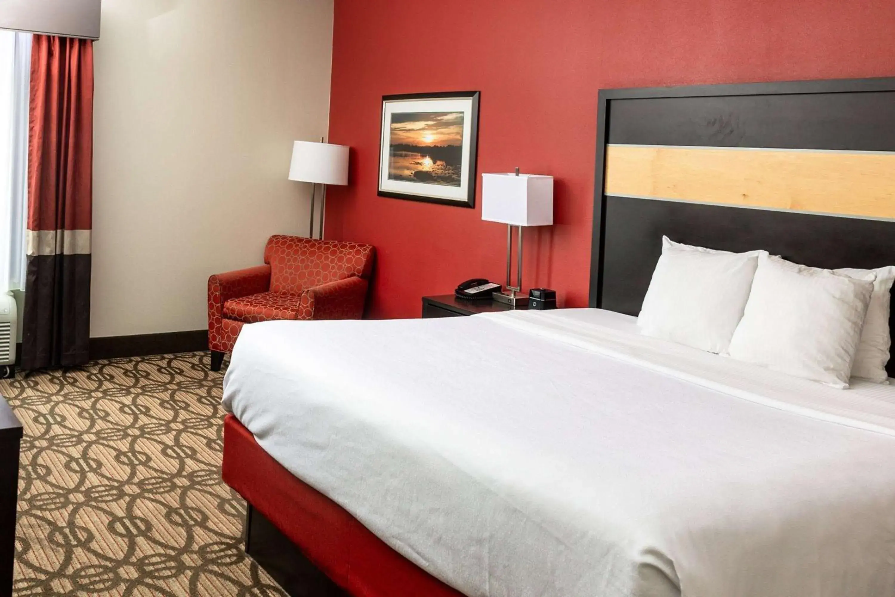 Deluxe King Room in La Quinta by Wyndham Starkville at MSU Deluxe King Room in La Quinta by Wyndham Starkville at MSU