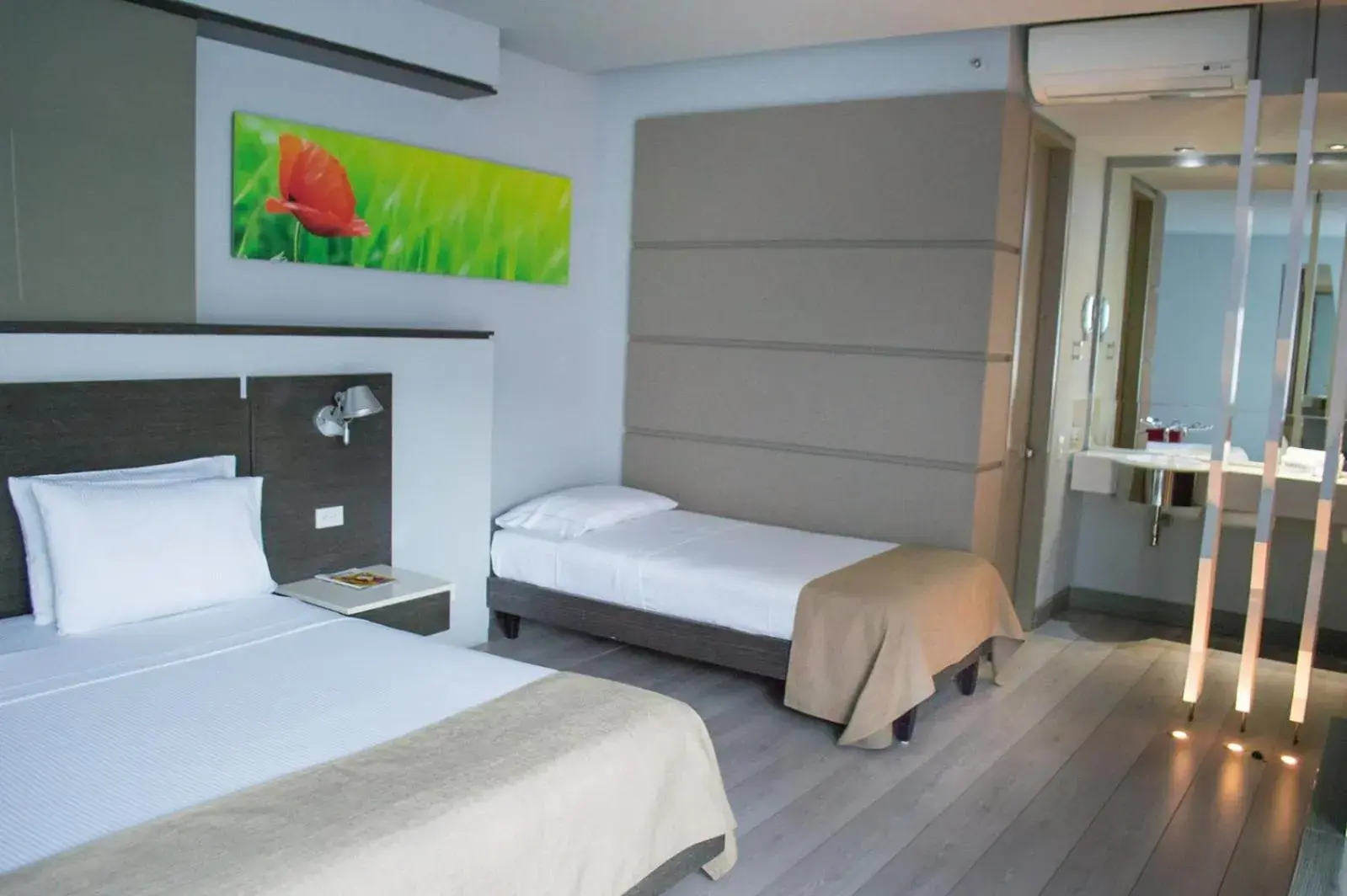 Triple Room in Inntu Hotel Triple Room in Inntu Hotel