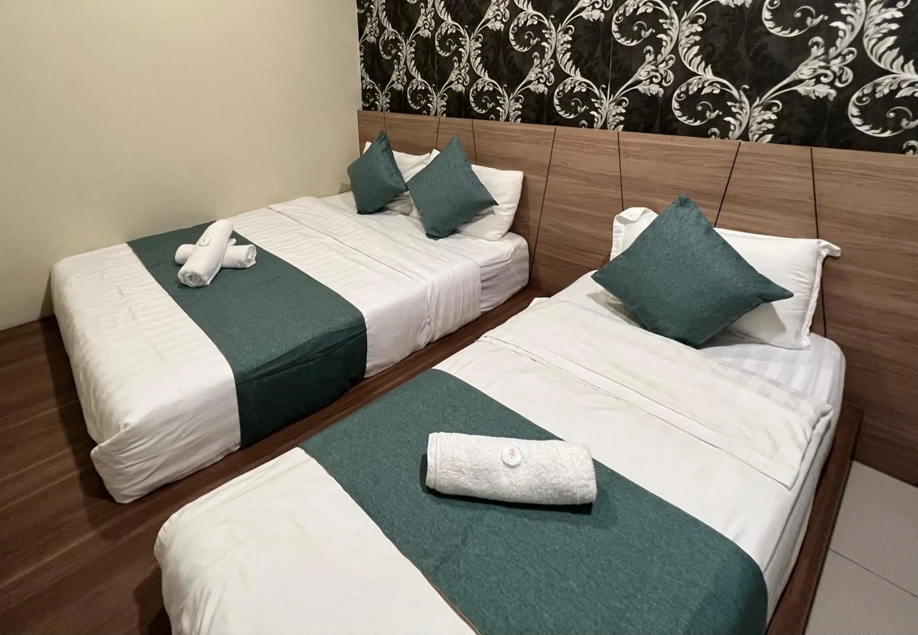 Triple Room in KUANTAN BESERAH BUDGET HOTEL Triple Room in KUANTAN BESERAH BUDGET HOTEL