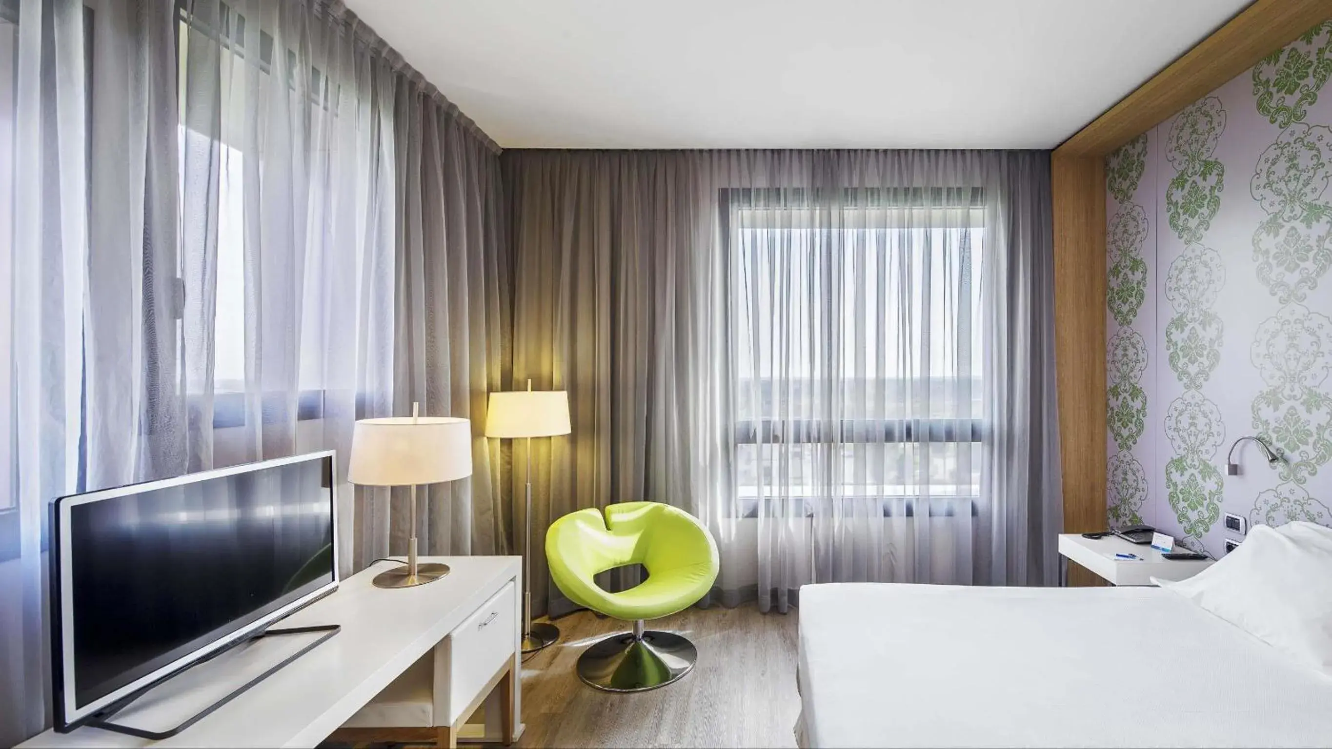 Junior Suite with Extra Bed (2 Adults + 1 Child) in NH Milano Fiera Junior Suite with Extra Bed (2 Adults + 1 Child) in NH Milano Fiera