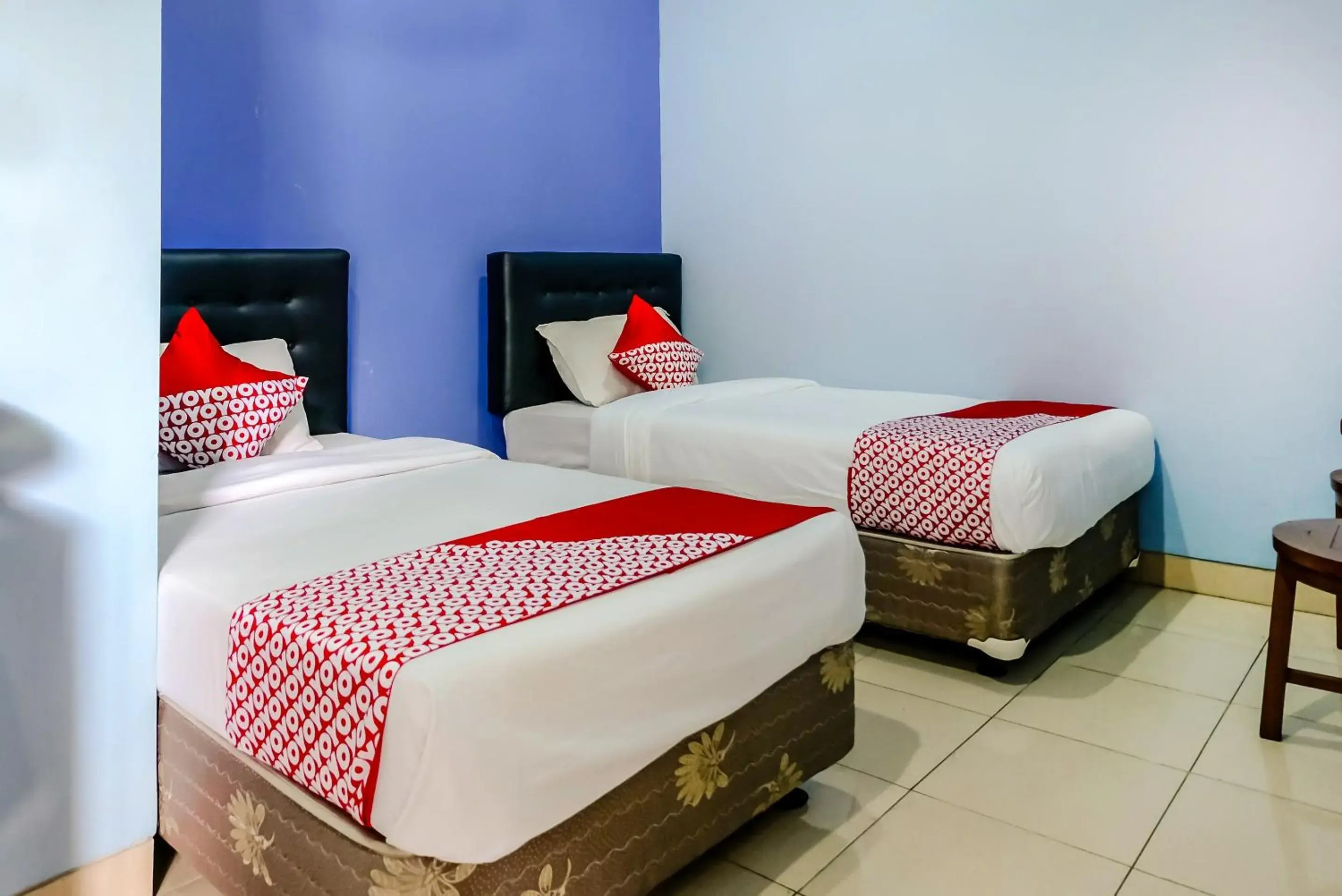 Standard Twin Room in Hotel O Guest House Amalia Malang Standard Twin Room in Hotel O Guest House Amalia Malang
