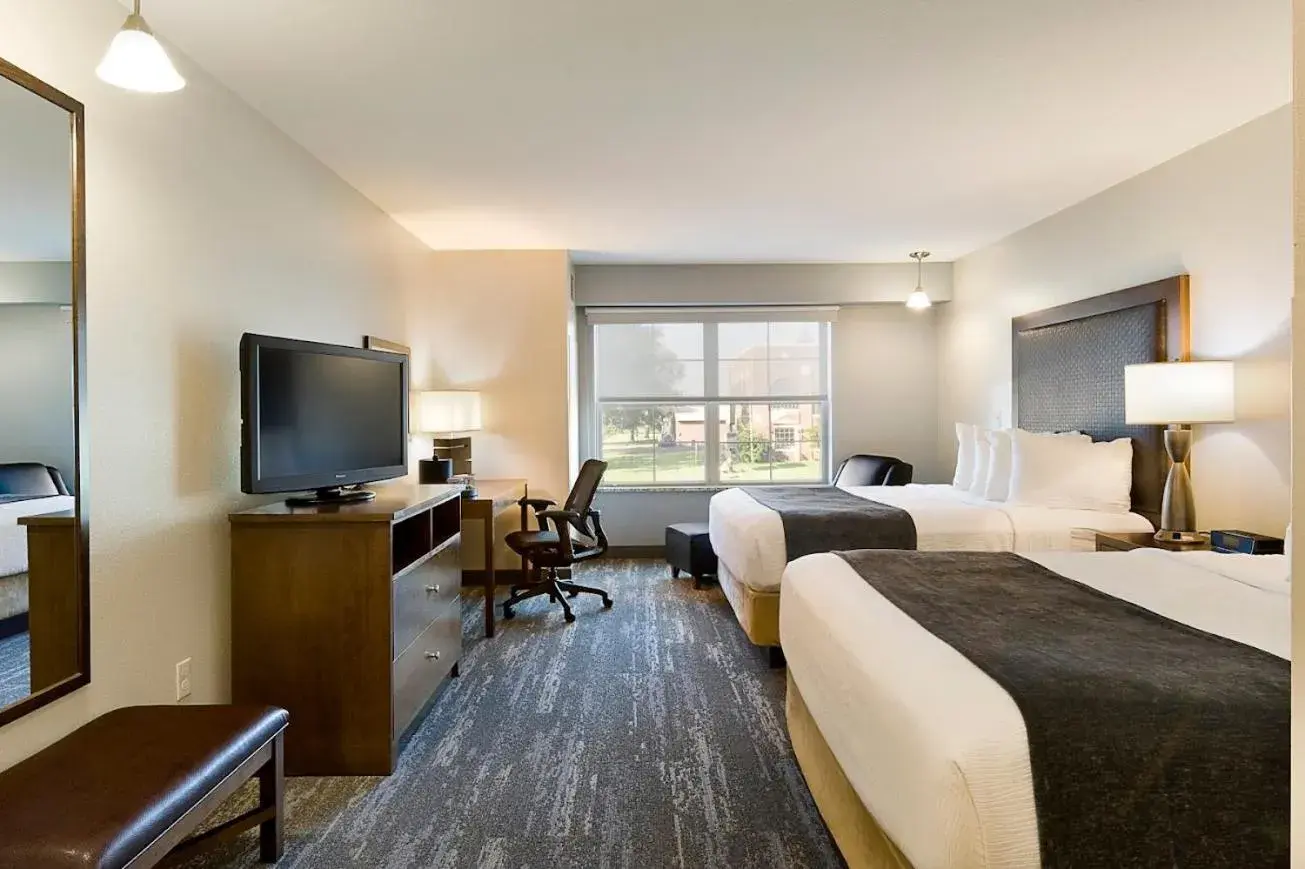 Queen Room with Two Queen Beds in ClubHouse Hotel and Suites Queen Room with Two Queen Beds in ClubHouse Hotel and Suites