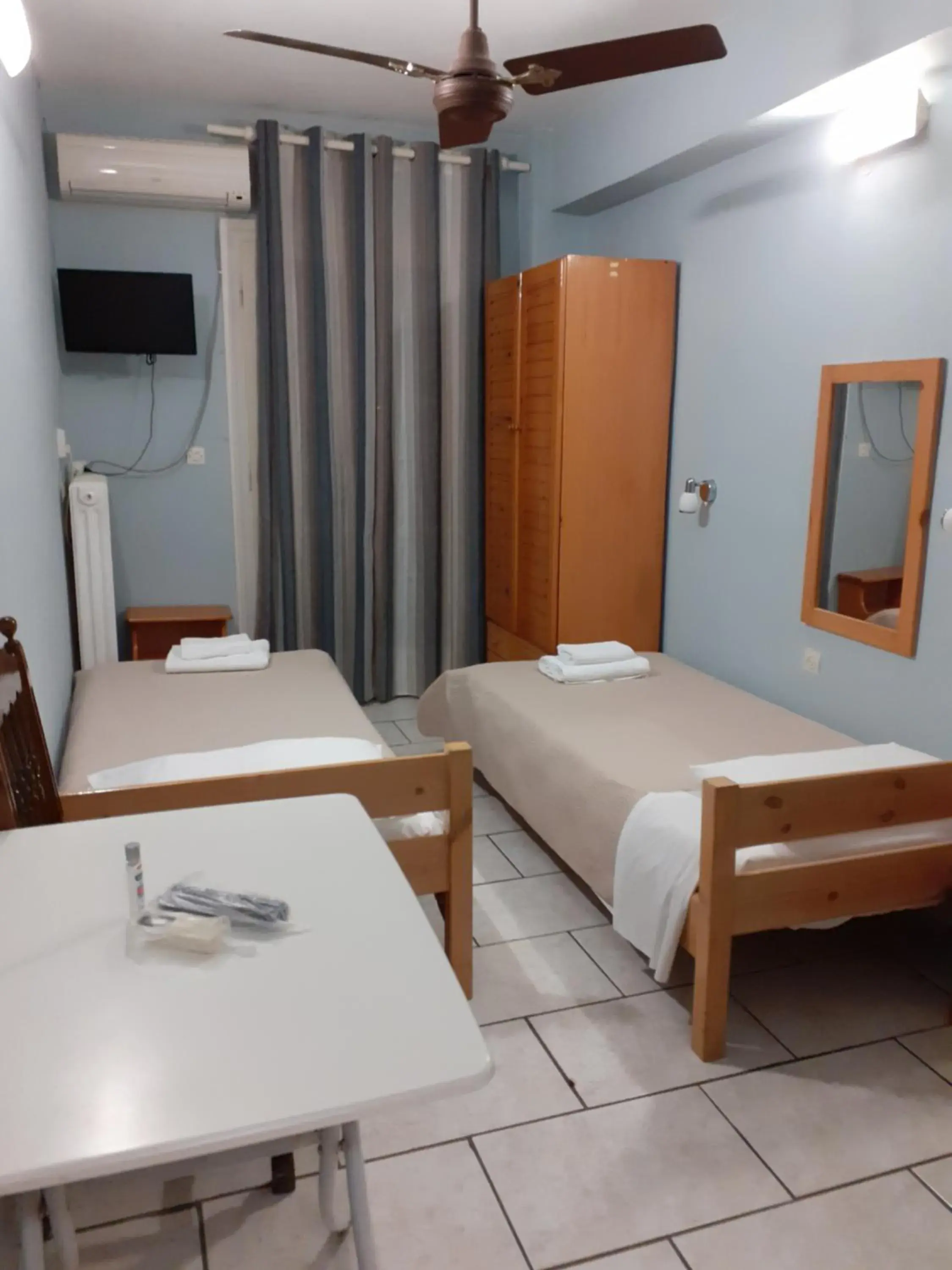 Twin Room with Sea View in Almiriki Rooms Twin Room with Sea View in Almiriki Rooms