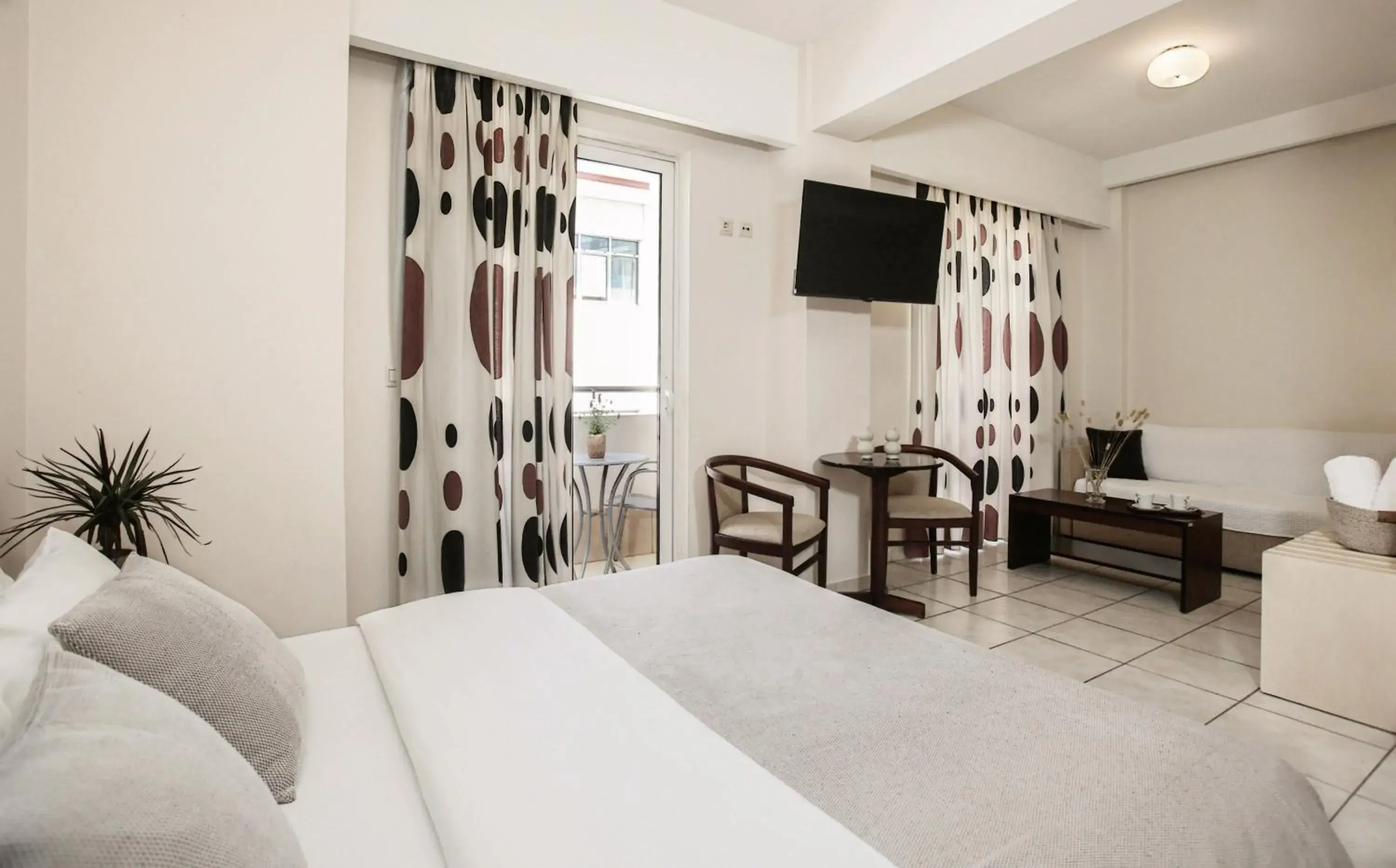 Family Room with Balcony in Hotel Astron Family Room with Balcony in Hotel Astron