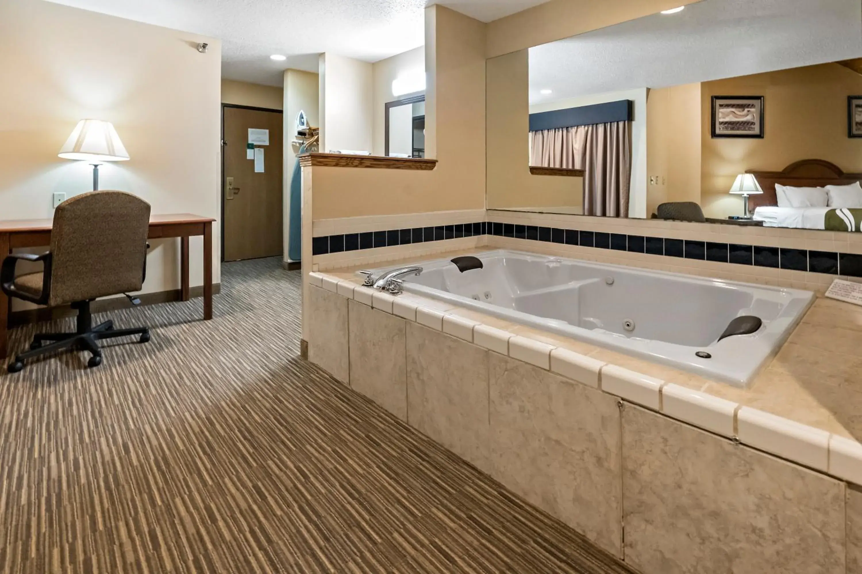 King Suite with Balcony - Non-smoking in Quality Inn - Storm Lake King Suite with Balcony - Non-smoking in Quality Inn - Storm Lake