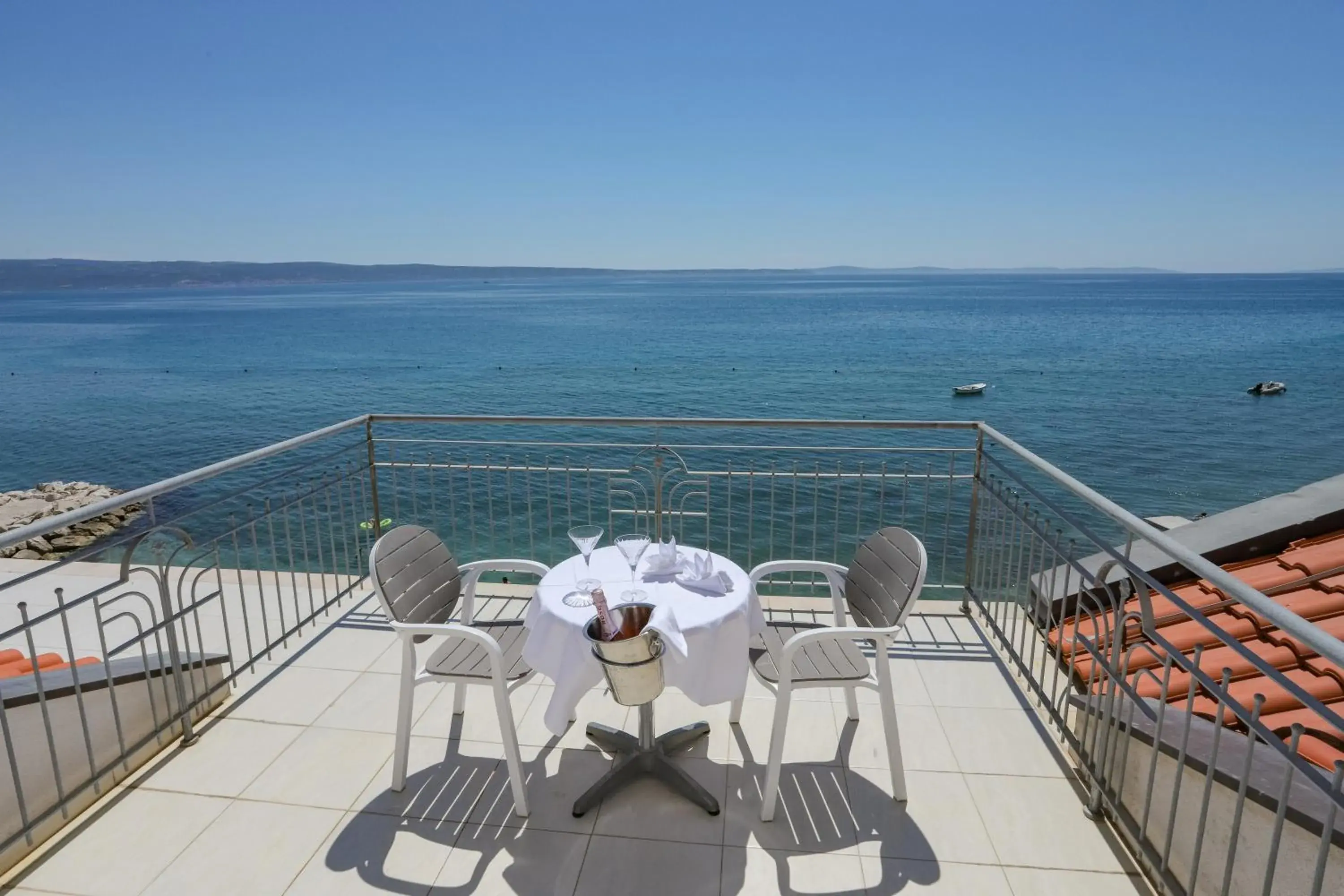 Deluxe Two-Bedroom Suite with Sea View (4 Adults + 2 Children) in Hotel Neva Deluxe Two-Bedroom Suite with Sea View (4 Adults + 2 Children) in Hotel Neva