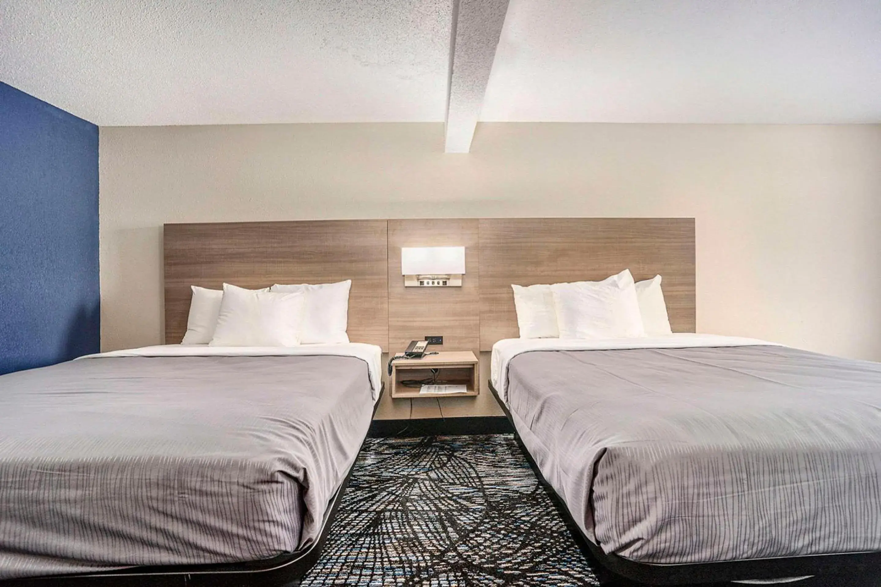 Queen Room with Two Queen Beds in Rodeway Inn Queen Room with Two Queen Beds in Rodeway Inn