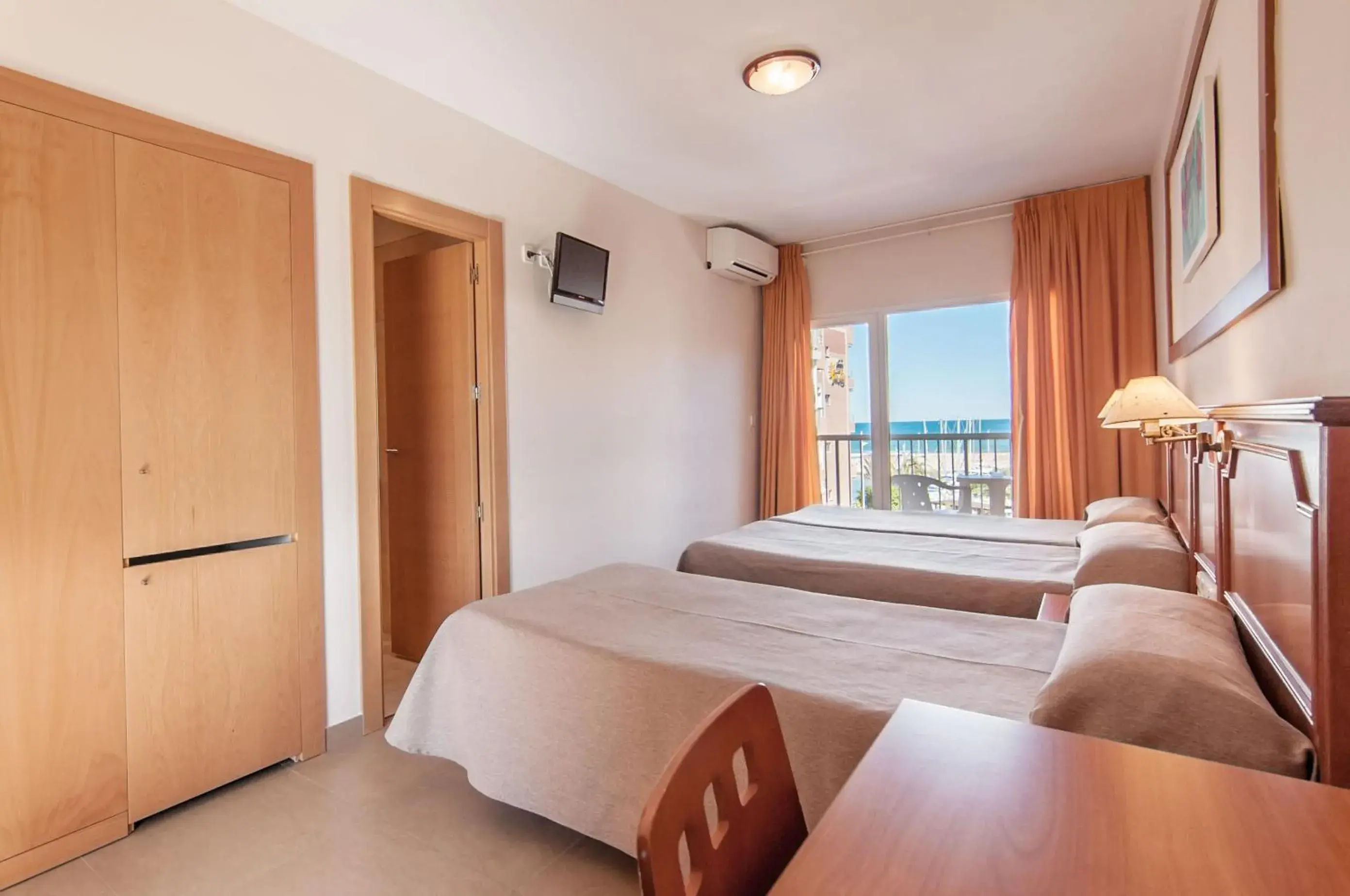 Quadruple Room (2 Adults + 2 Children) in Hotel San Luis Quadruple Room (2 Adults + 2 Children) in Hotel San Luis