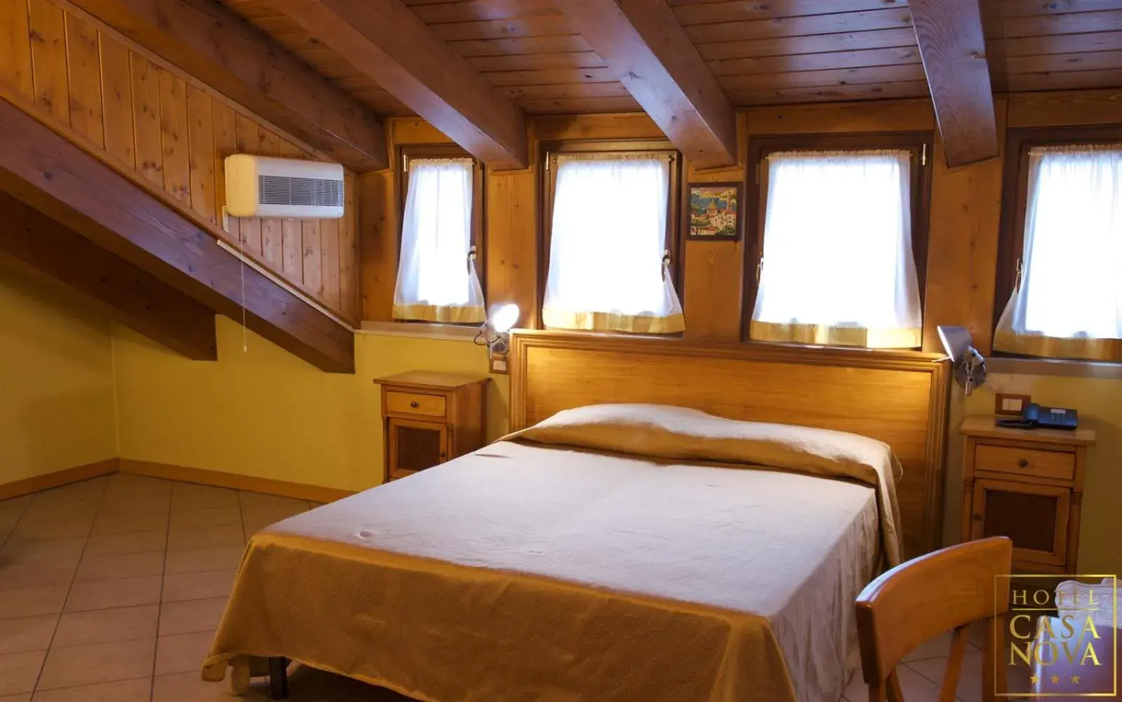 Standard Triple Room in Hotel Casanova Standard Triple Room in Hotel Casanova