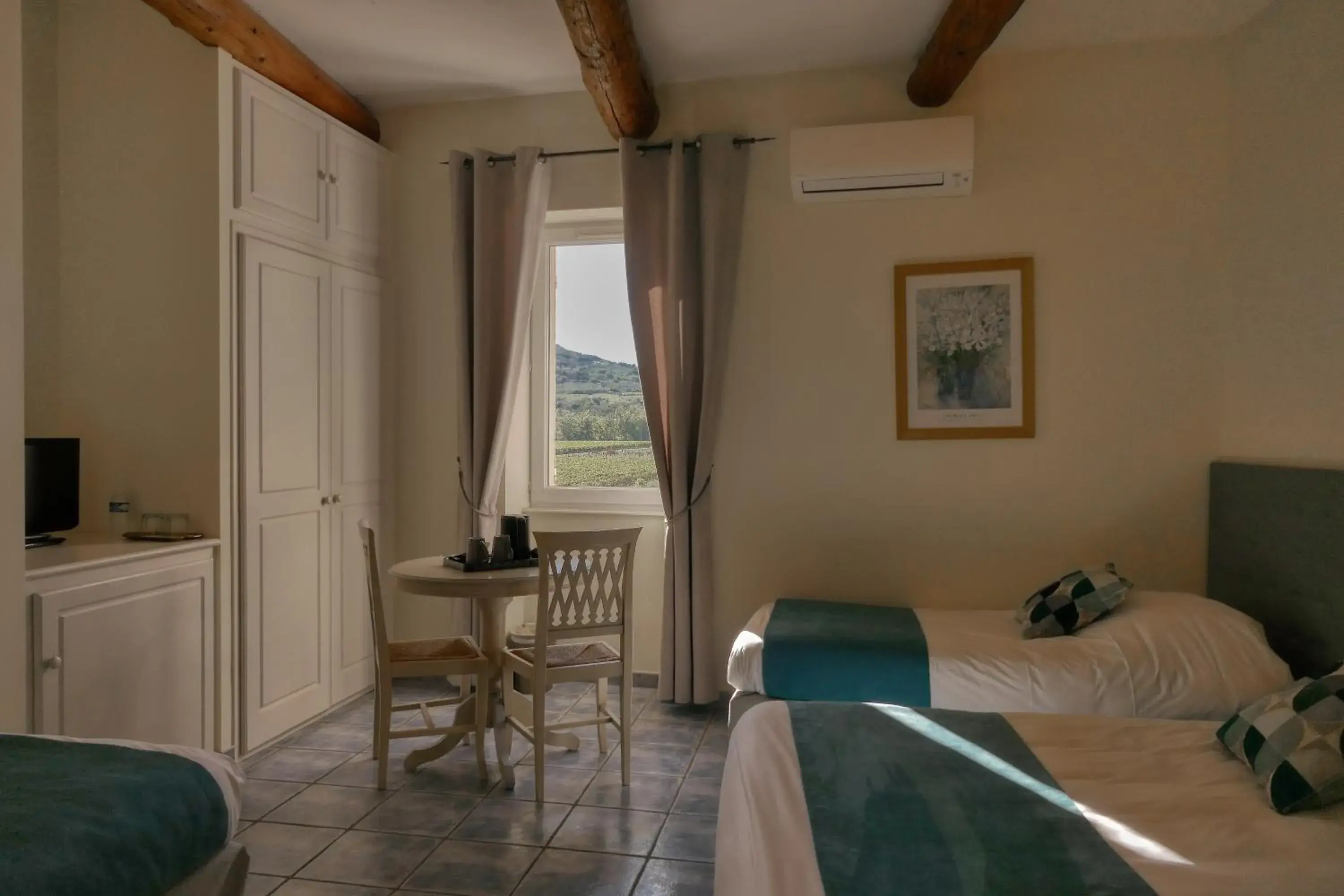 Family Room in Logis Hôtel La Bastide des Monges Family Room in Logis Hôtel La Bastide des Monges