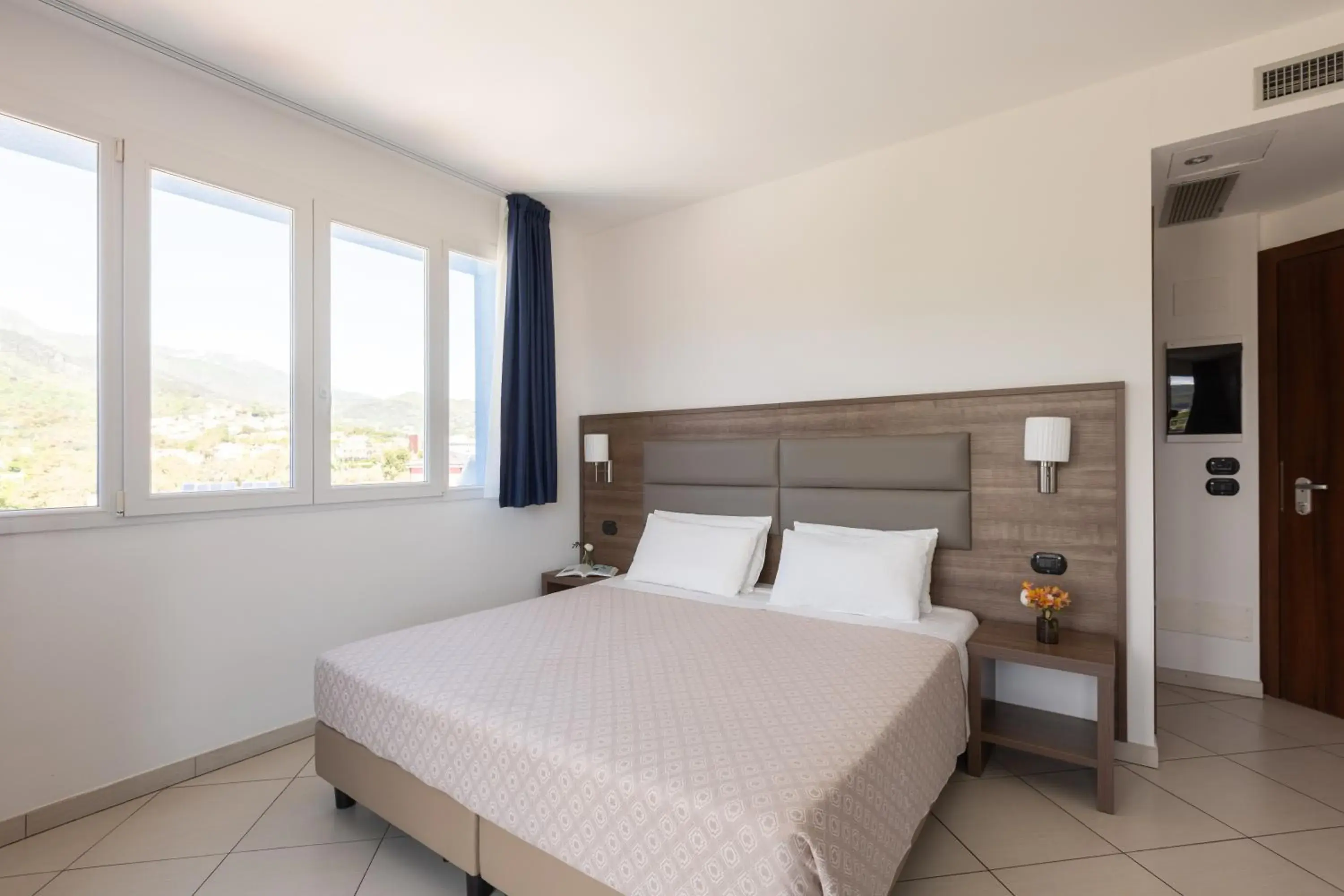 Double Room with Mountain View in Ai Pozzi Village Resort & SPA Double Room with Mountain View in Ai Pozzi Village Resort & SPA