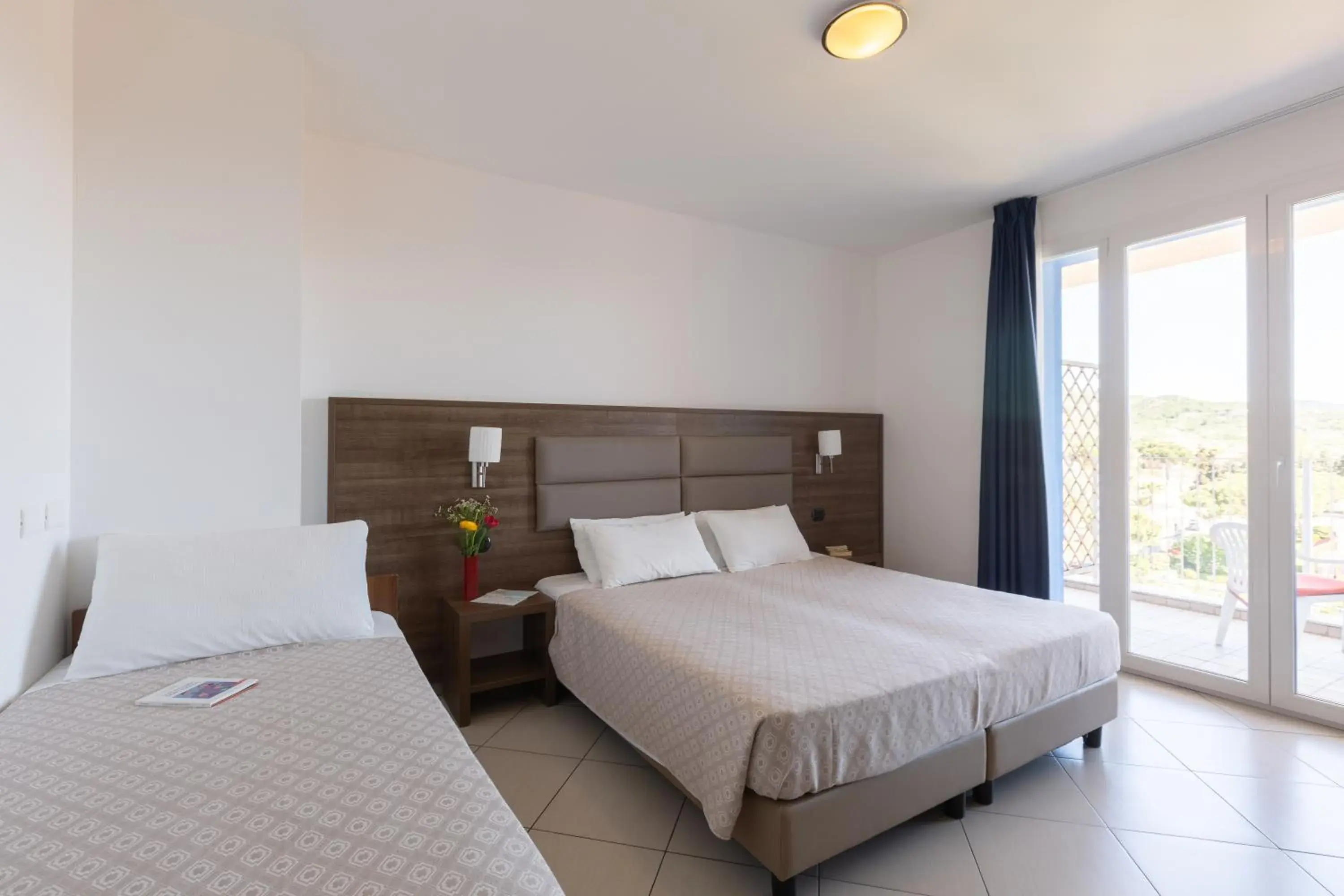 Classic Triple Room in Ai Pozzi Village Resort & SPA Classic Triple Room in Ai Pozzi Village Resort & SPA