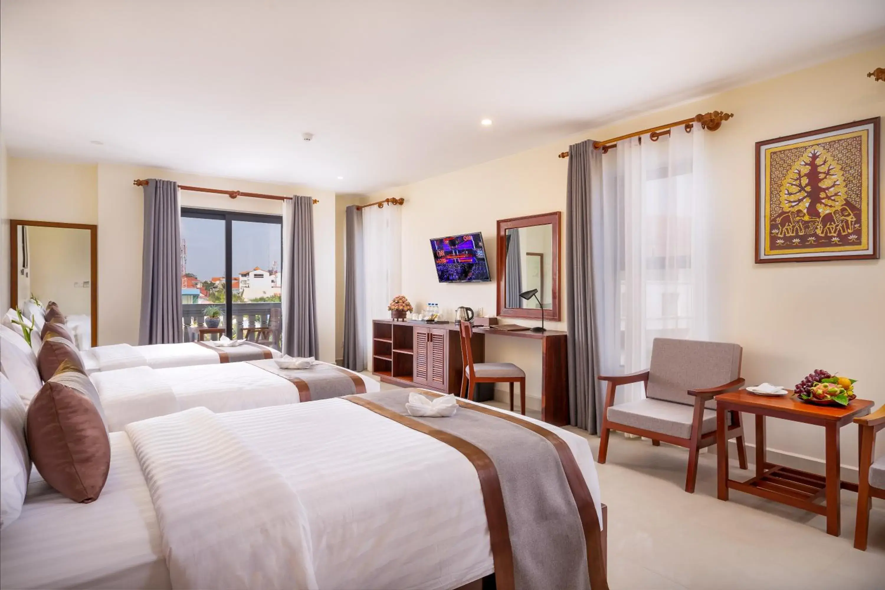 Deluxe Triple Room With Balcony in Mony Reach Angkor Hotel Deluxe Triple Room With Balcony in Mony Reach Angkor Hotel