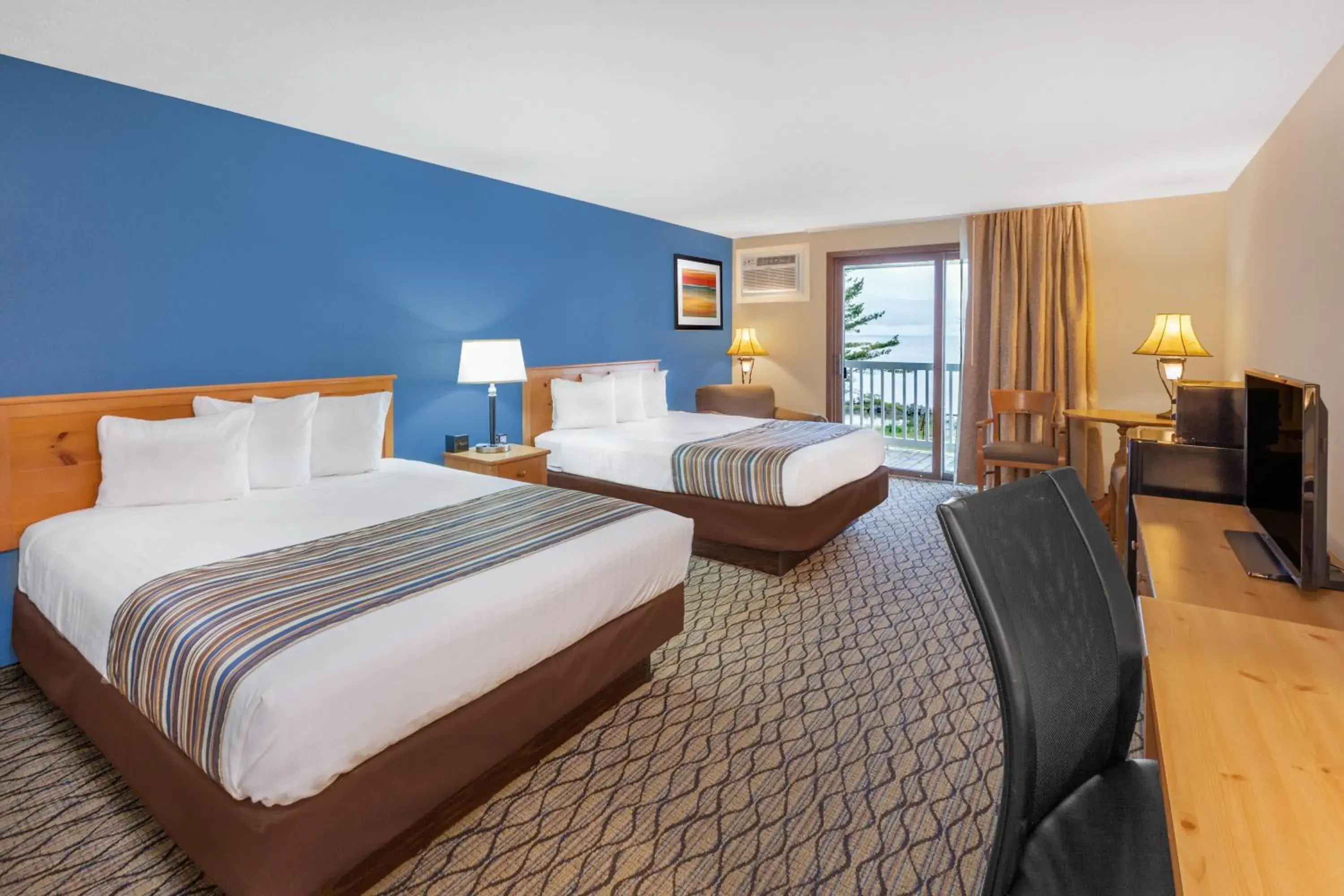 Queen Room with Two Queen Beds with Lake View - Pet Friendly in Baymont by Wyndham St. Ignace Lakefront Queen Room with Two Queen Beds with Lake View - Pet Friendly in Baymont by Wyndham St. Ignace Lakefront