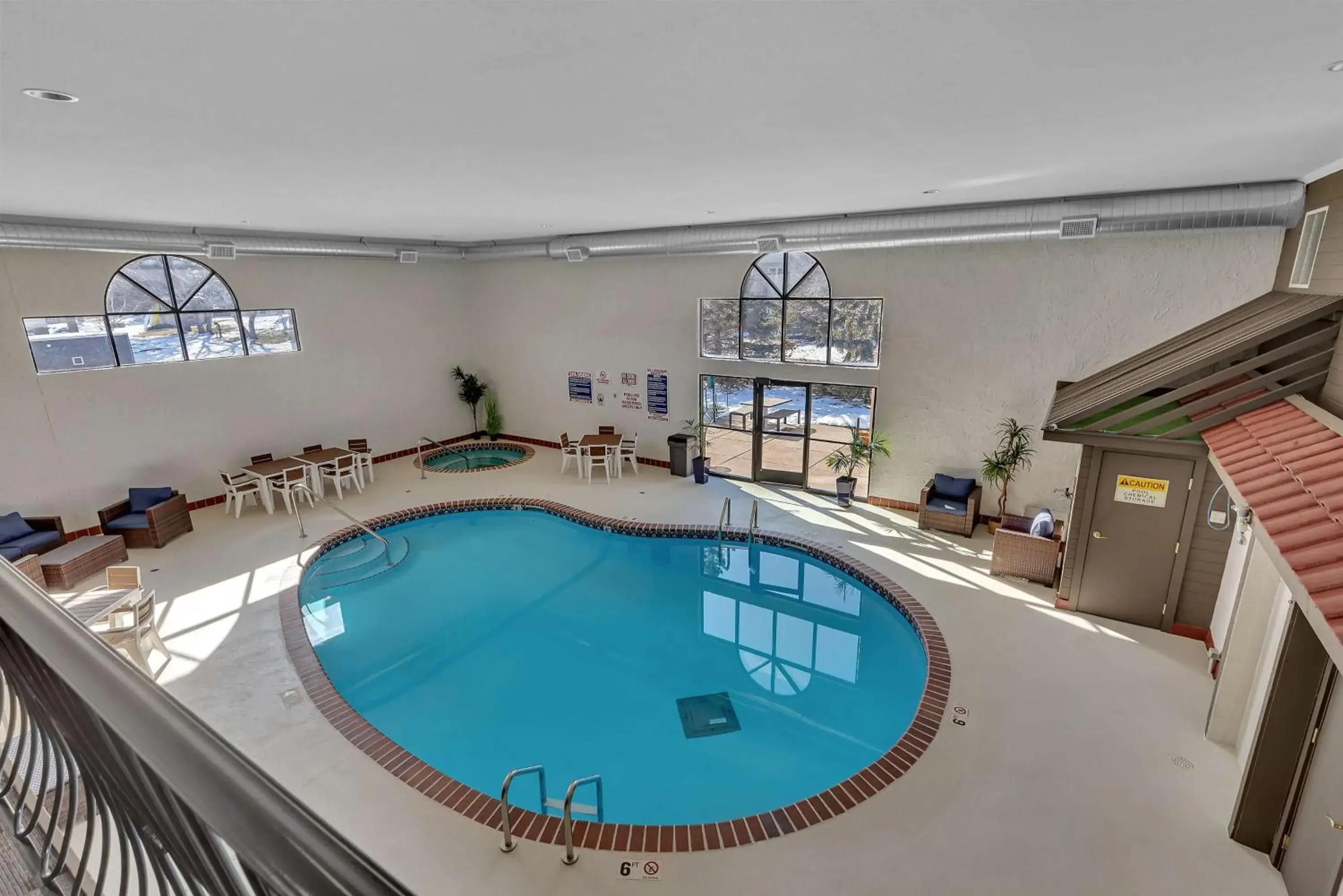 Queen Room with Two Queen Beds with Balcony and Pool View - Non-Smoking in SureStay Hotel by Best Western Spicer Queen Room with Two Queen Beds with Balcony and Pool View - Non-Smoking in SureStay Hotel by Best Western Spicer