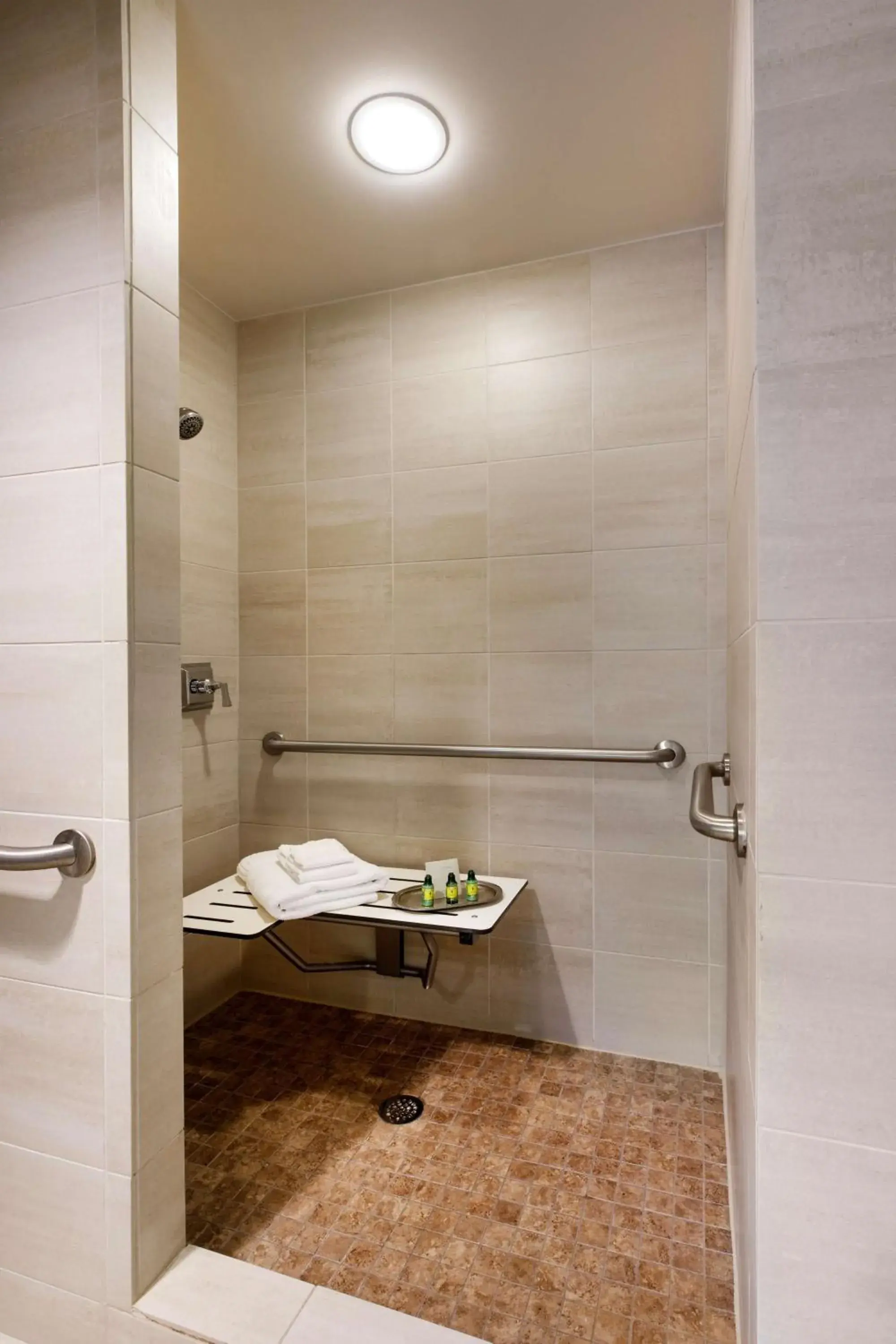 Deluxe King Room with Roll-In Shower - Mobility/Hearing Access in Colcord Hotel Oklahoma City, Curio Collection by Hilton Deluxe King Room with Roll-In Shower - Mobility/Hearing Access in Colcord Hotel Oklahoma City, Curio Collection by Hilton