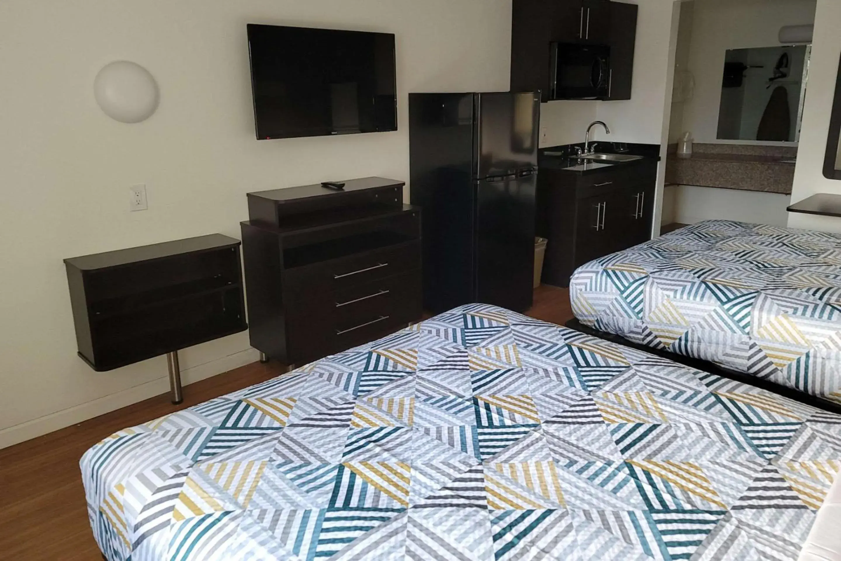 Quadruple Room with Two Queen Beds - Non Smoking in Rodeway Inn & Suites Thousand Palms - Rancho Mirage Quadruple Room with Two Queen Beds - Non Smoking in Rodeway Inn & Suites Thousand Palms - Rancho Mirage