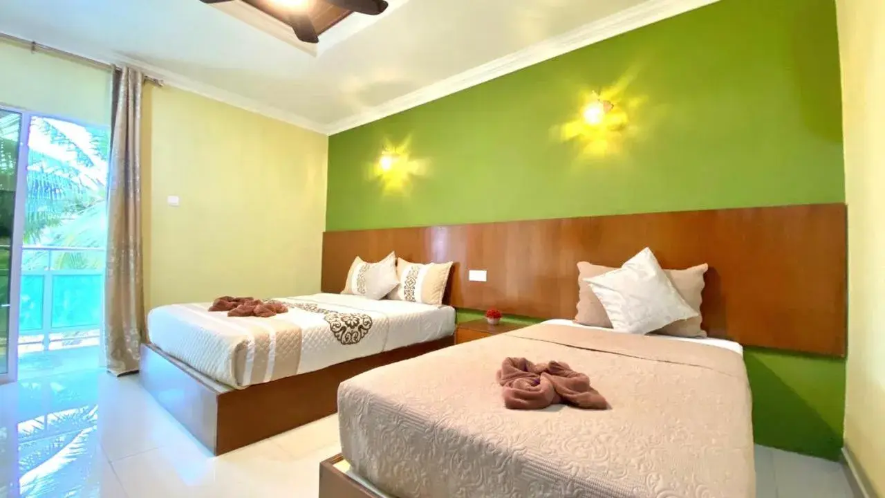 Deluxe Triple Room in Norshah Village Resort Deluxe Triple Room in Norshah Village Resort