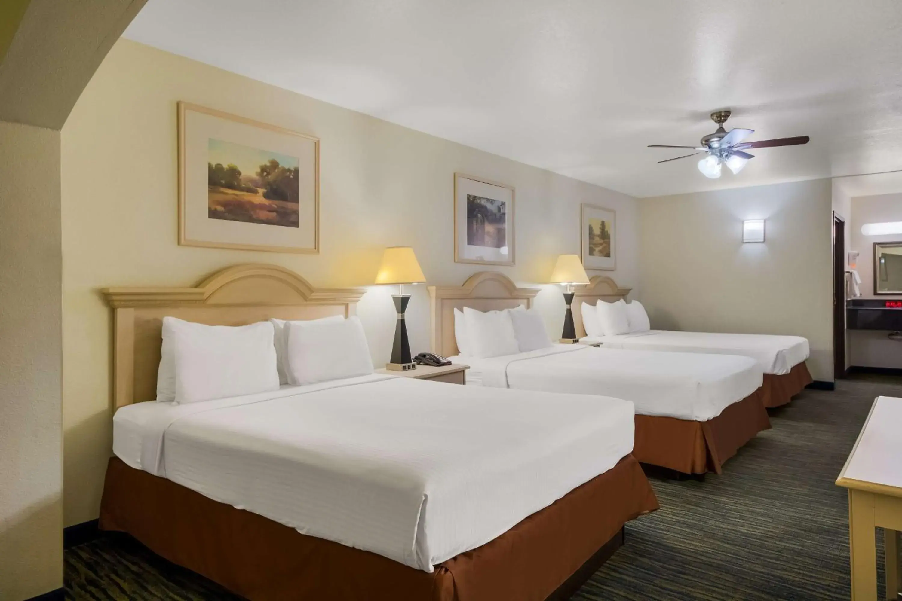 Queen Room with Three Queen Beds in SureStay Hotel by Best Western Falfurrias Queen Room with Three Queen Beds in SureStay Hotel by Best Western Falfurrias