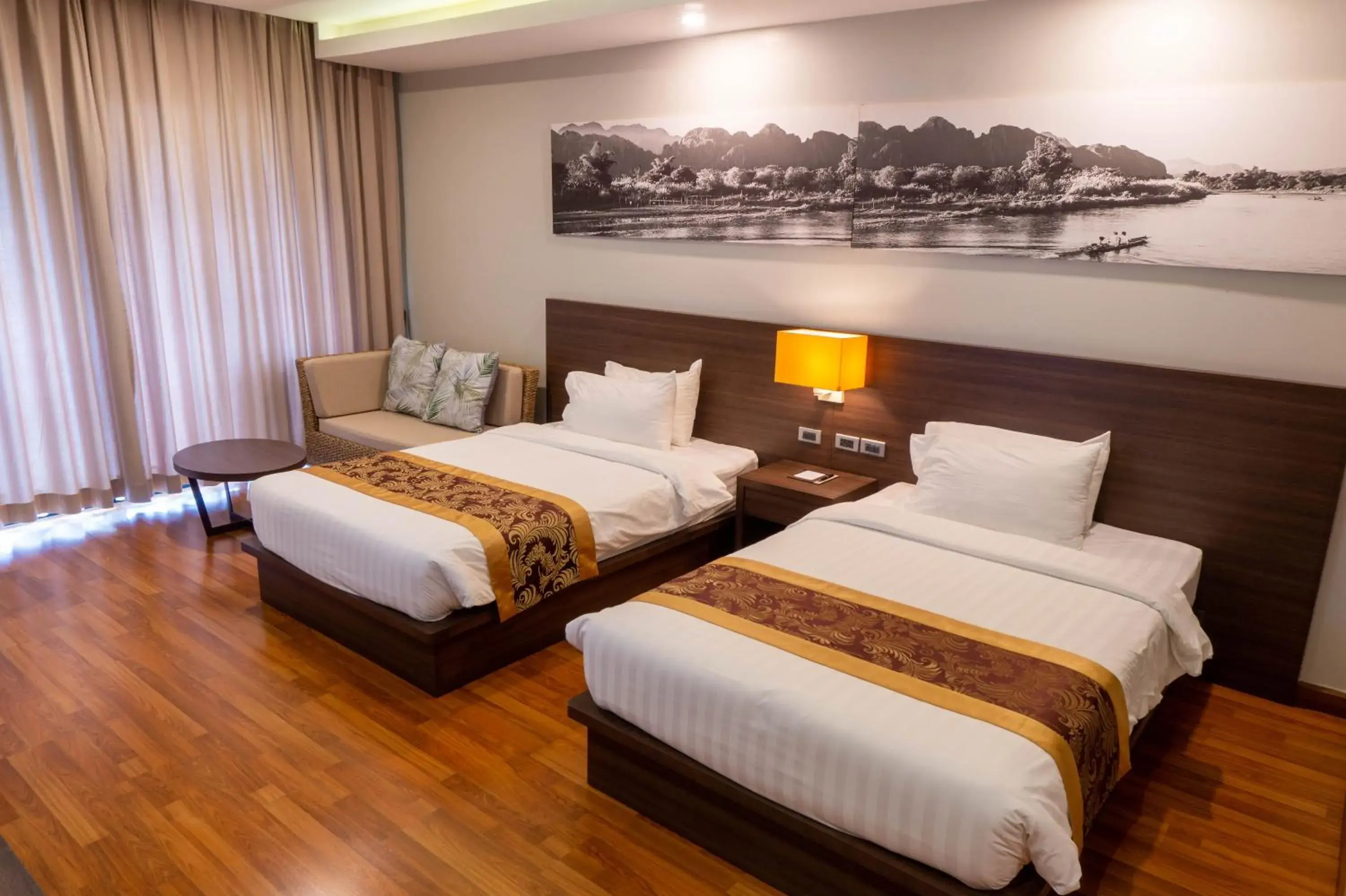 Deluxe Twin Room in Tmark Resort Vangvieng Deluxe Twin Room in Tmark Resort Vangvieng