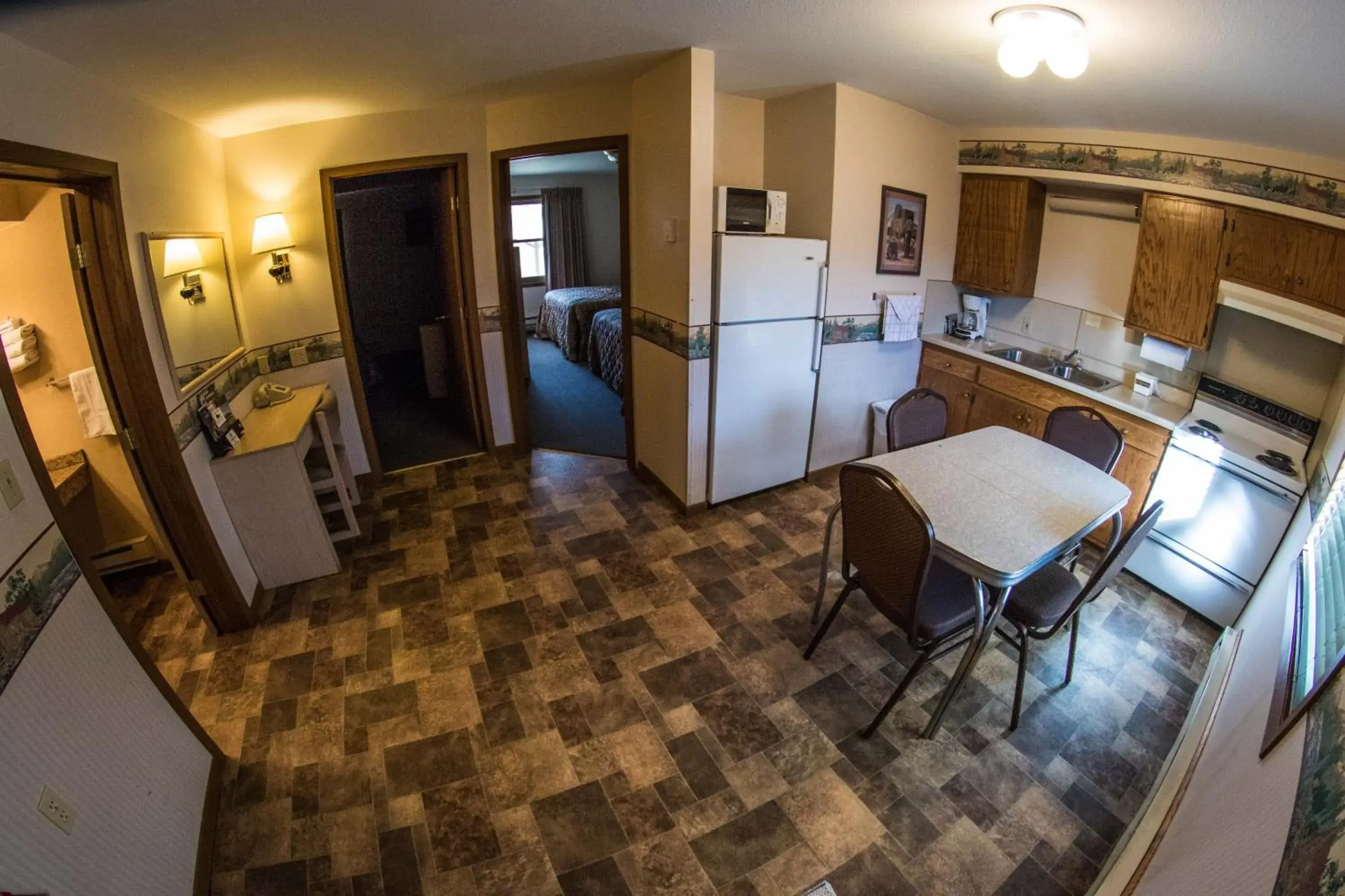 Two-Bedroom Suite with Kitchenette in Stagecoach Inn & Suites Two-Bedroom Suite with Kitchenette in Stagecoach Inn & Suites