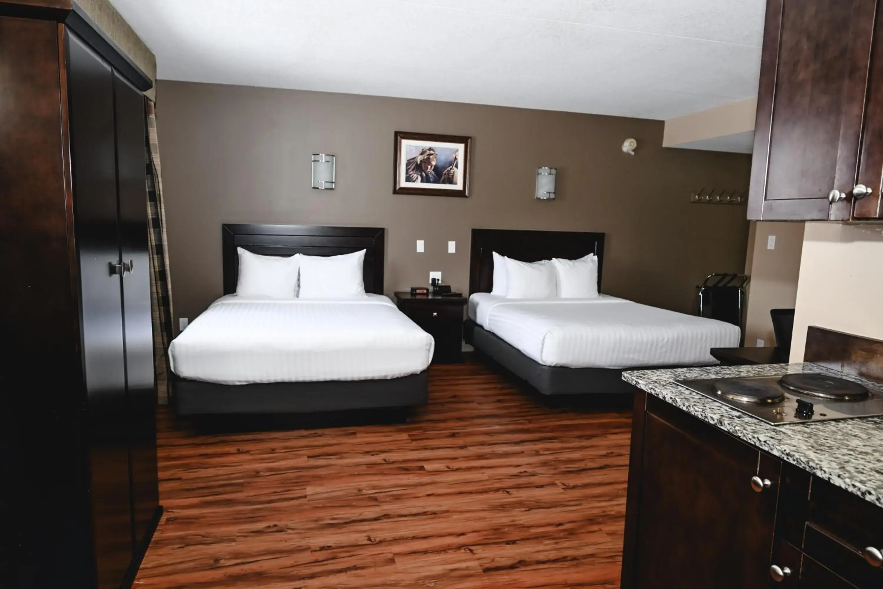 Efficiency Quadruple Room with Two Queen Beds - Non Smoking/Ground floor in Quality Hotel & Conference Centre Efficiency Quadruple Room with Two Queen Beds - Non Smoking/Ground floor in Quality Hotel & Conference Centre