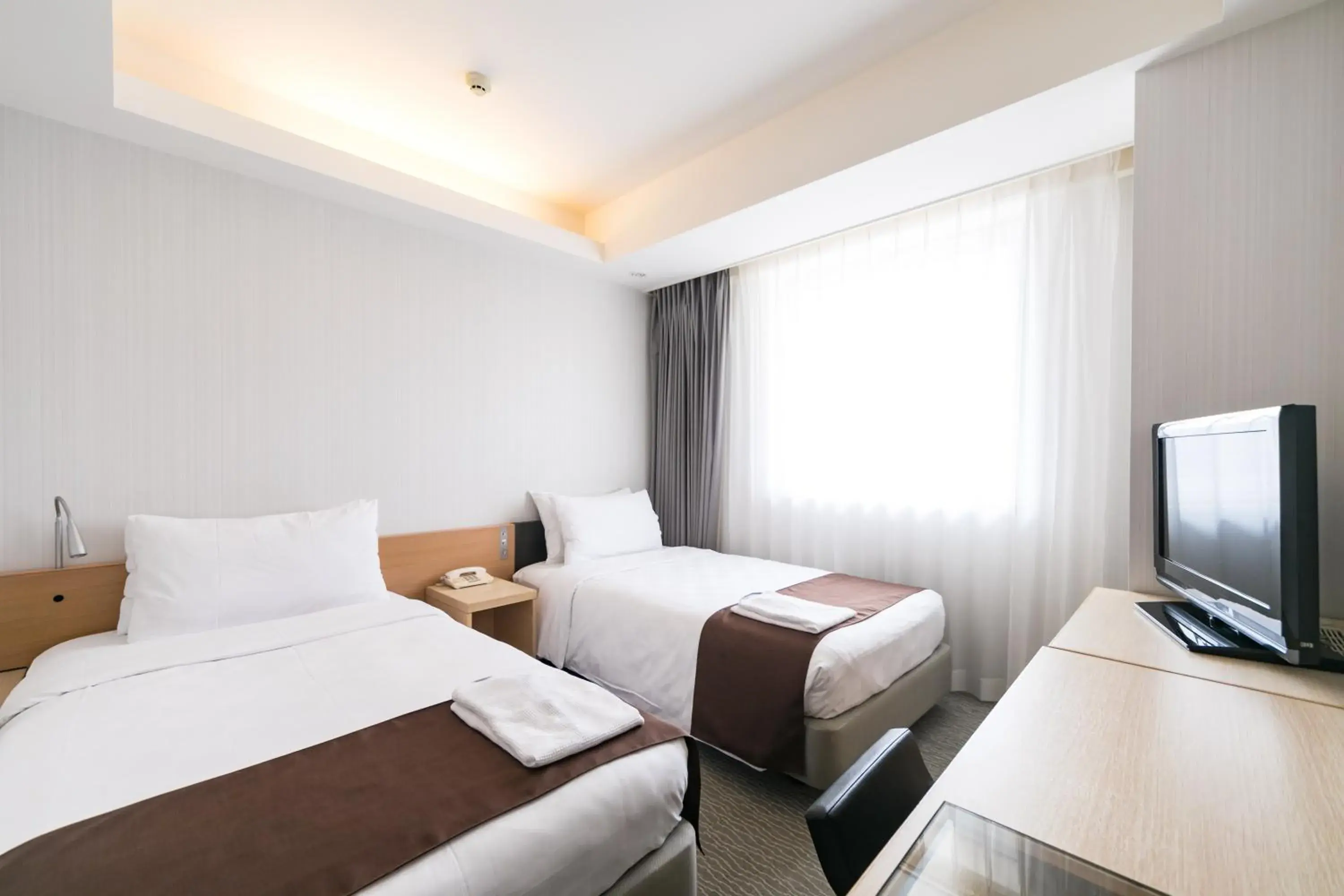 2 Twin Rooms, Adjoining, Non Smoking (2 rooms not connected) in Naha Tokyu REI Hotel 2 Twin Rooms, Adjoining, Non Smoking (2 rooms not connected) in Naha Tokyu REI Hotel