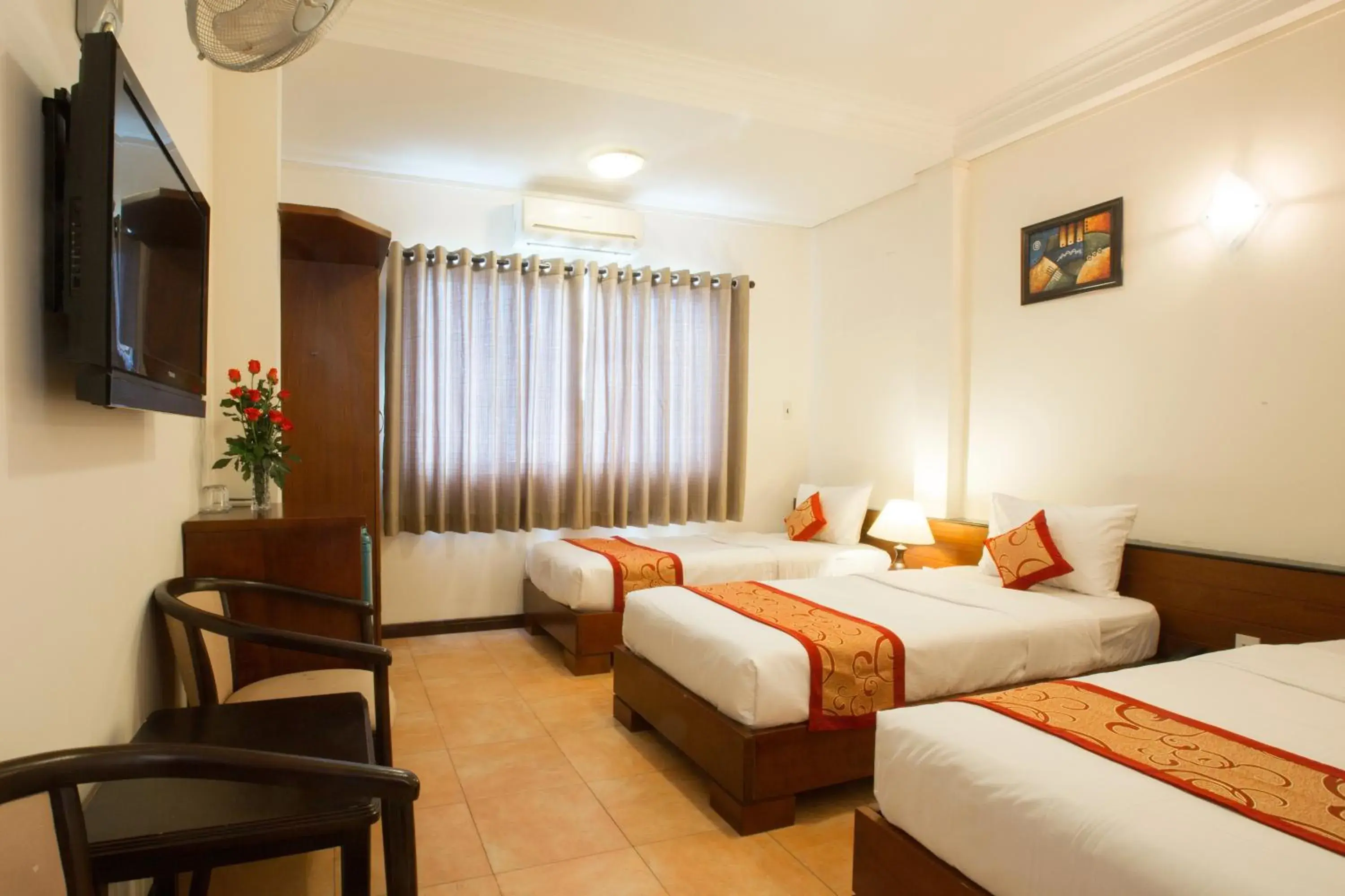 Deluxe Triple Room in Ngoc Minh Hotel Deluxe Triple Room in Ngoc Minh Hotel