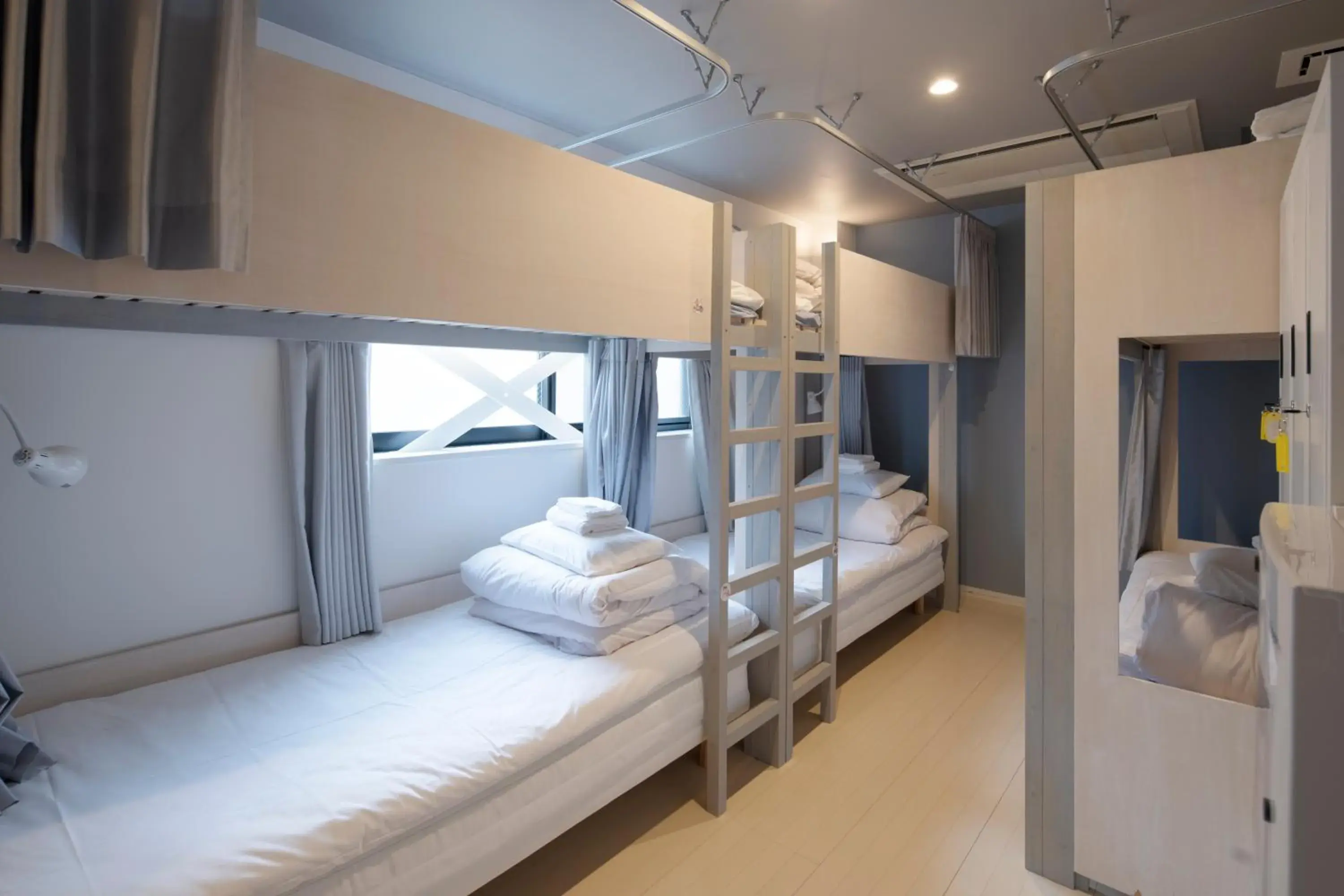 Bunk Bed in Mixed Dormitory Room in Iwatoyama Hostel Bunk Bed in Mixed Dormitory Room in Iwatoyama Hostel