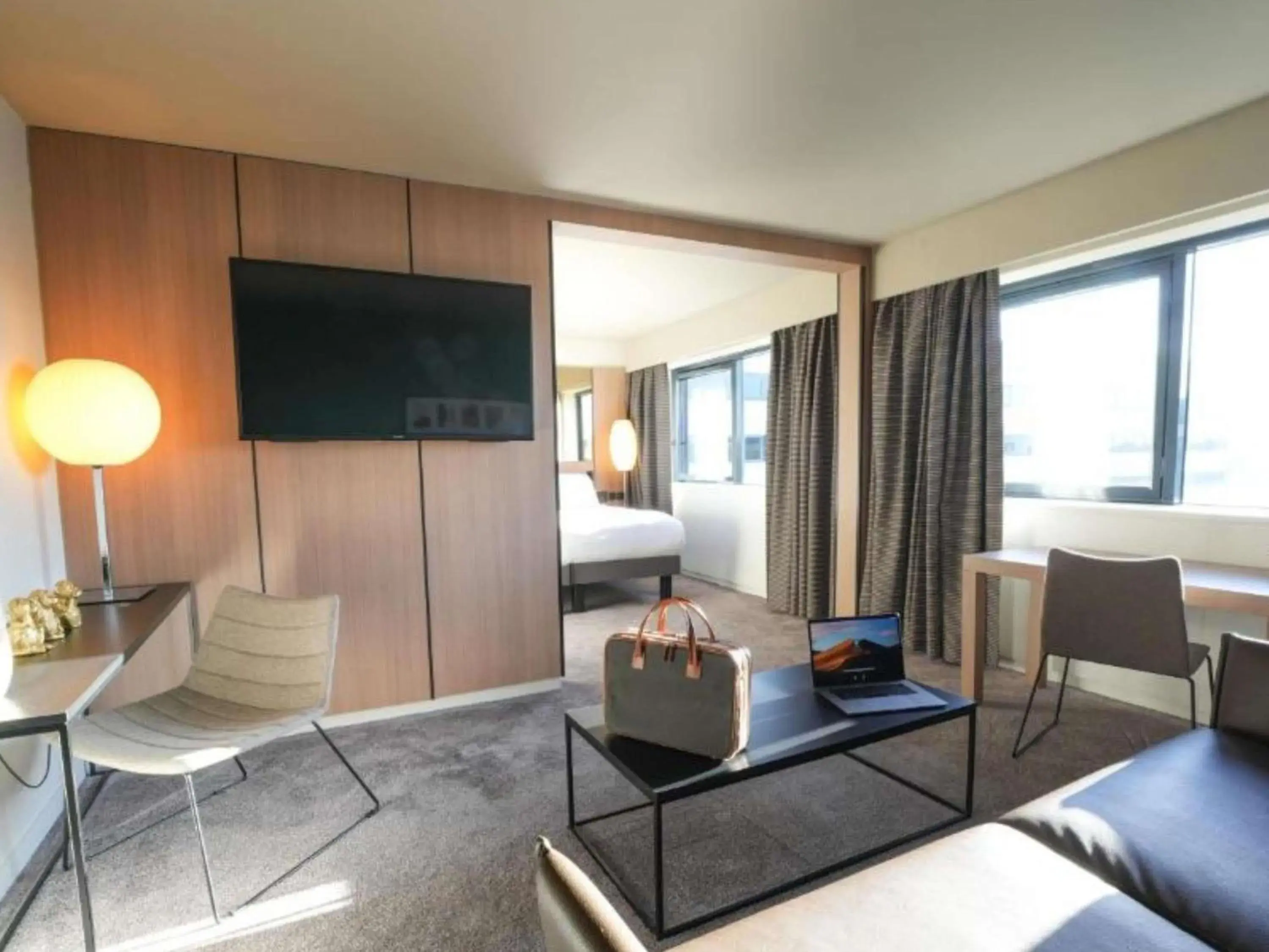 Junior King Suite with Lounge in Pullman Bordeaux Lac Junior King Suite with Lounge in Pullman Bordeaux Lac