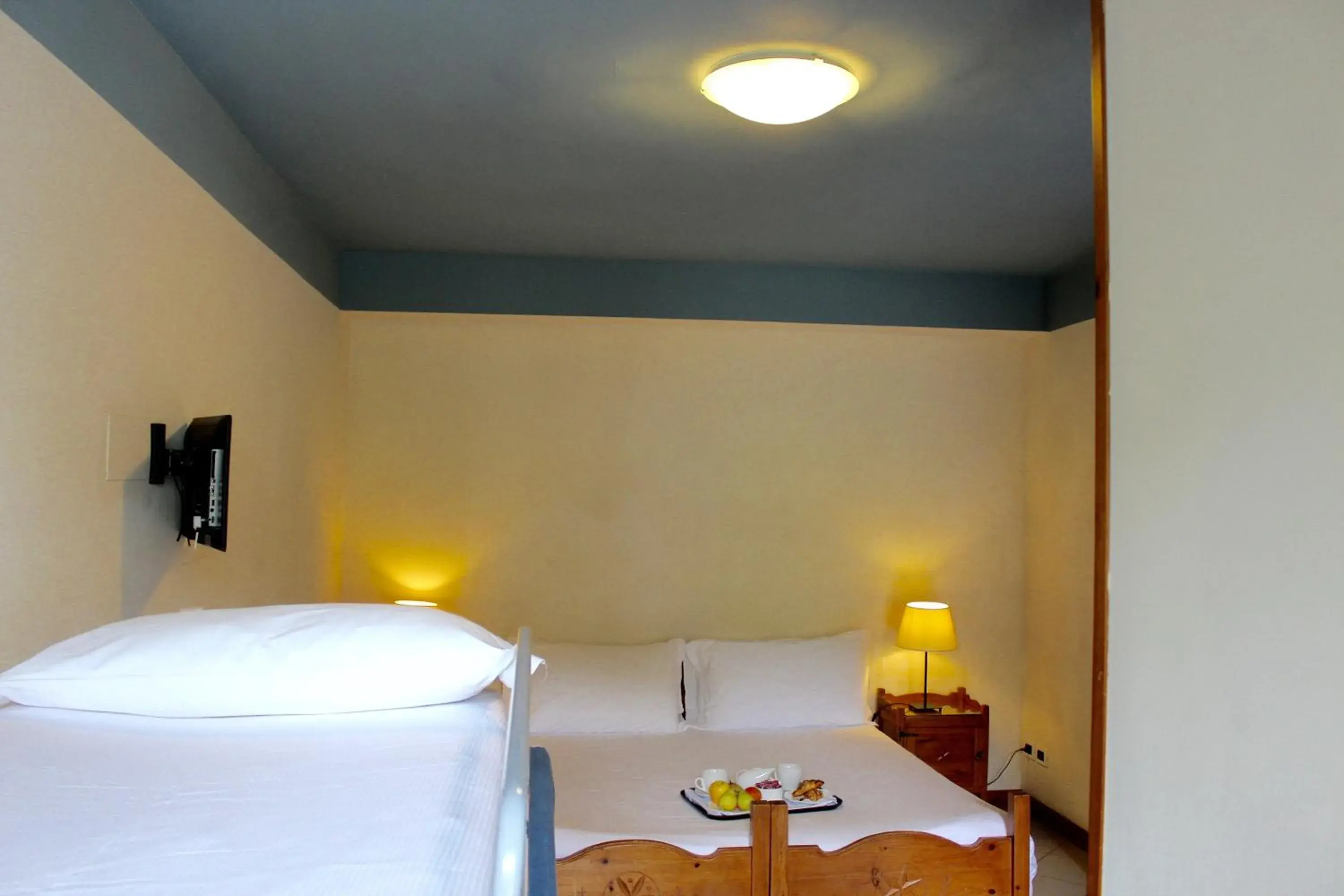 Standard Quadruple Room in Hotel Miramonti Family & SPA Standard Quadruple Room in Hotel Miramonti Family & SPA