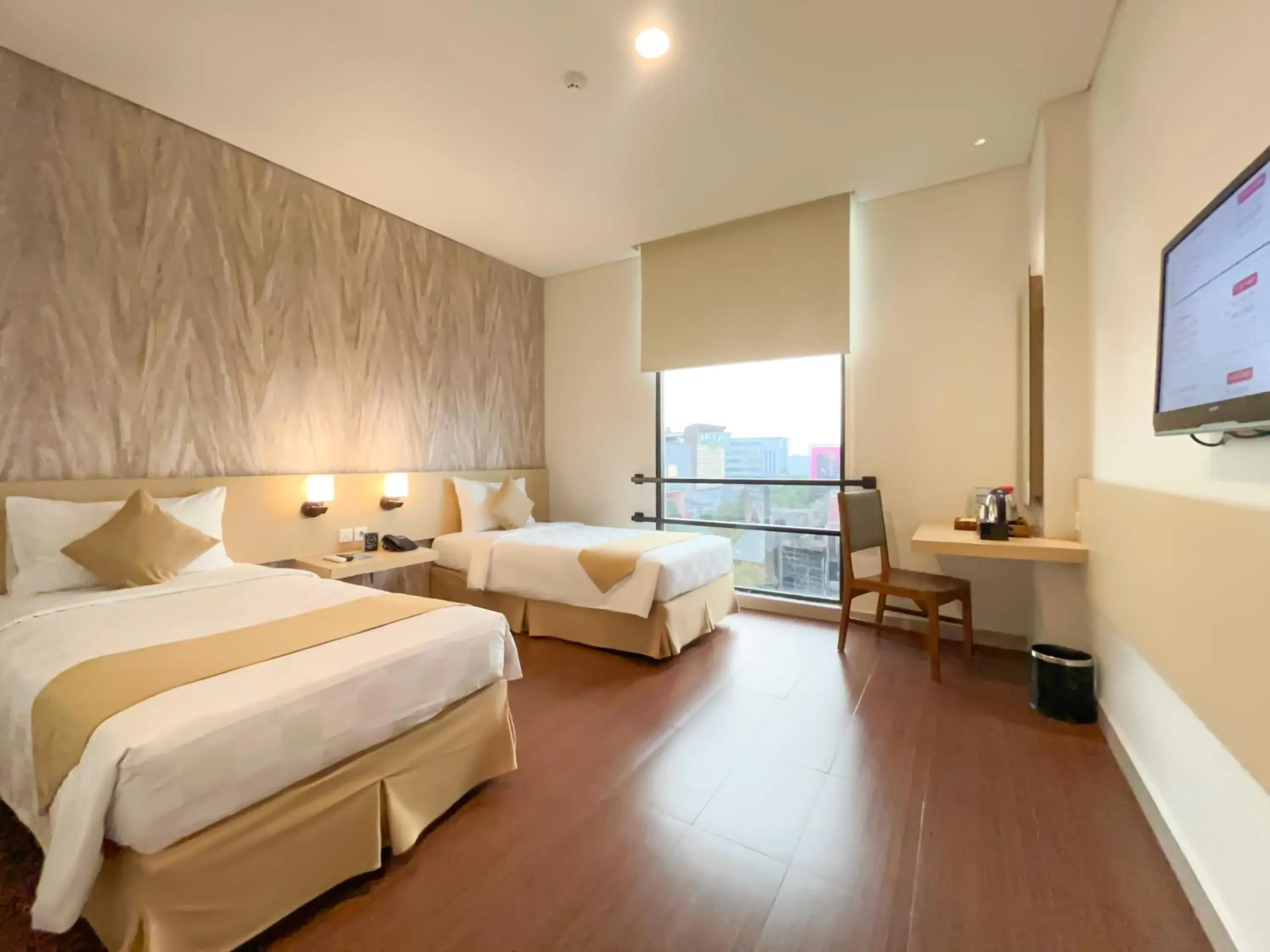 Deluxe Twin Room in Hotel 88 Embong Malang Tunjungan Surabaya by WH - Breakfast with The Best View on The Highest Floor and Strategic Location in The City Center Deluxe Twin Room in Hotel 88 Embong Malang Tunjungan Surabaya by WH - Breakfast with The Best View on The Highest Floor and Strategic Location in The City Center