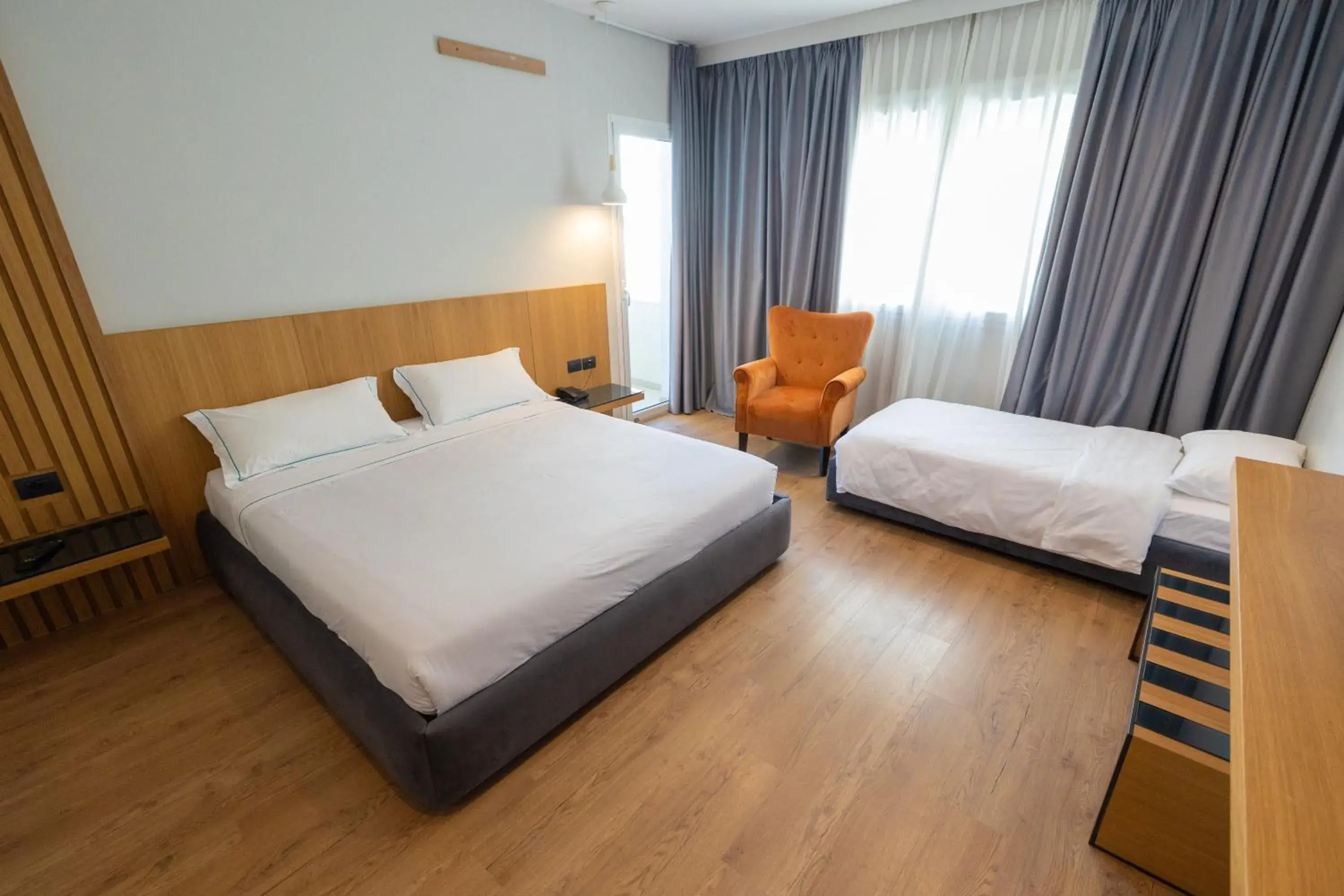 Triple Room with balcony and side Sea View in DUKA Hotel Triple Room with balcony and side Sea View in DUKA Hotel
