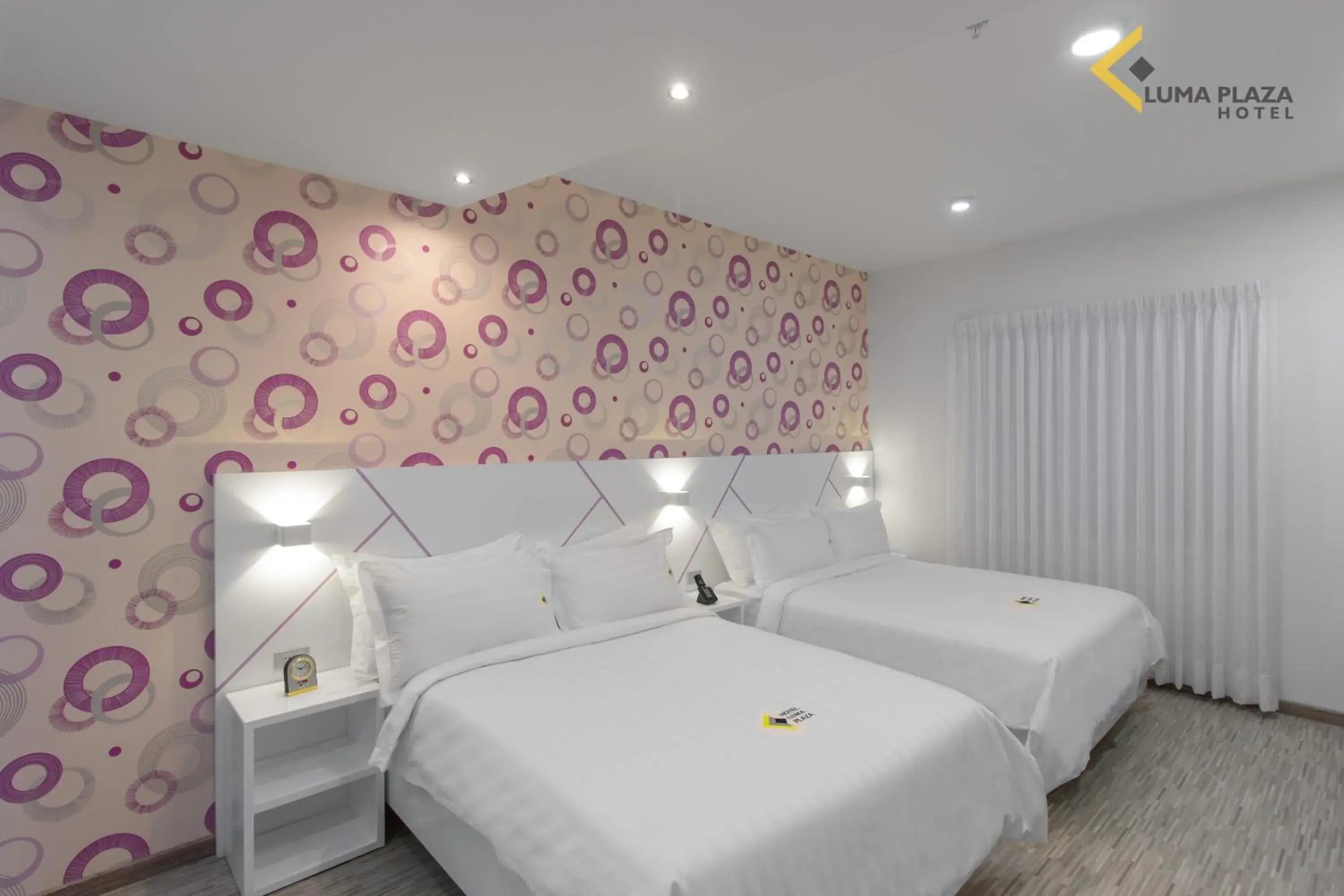 Standard Quadruple Room in Luma Plaza Hotel Standard Quadruple Room in Luma Plaza Hotel