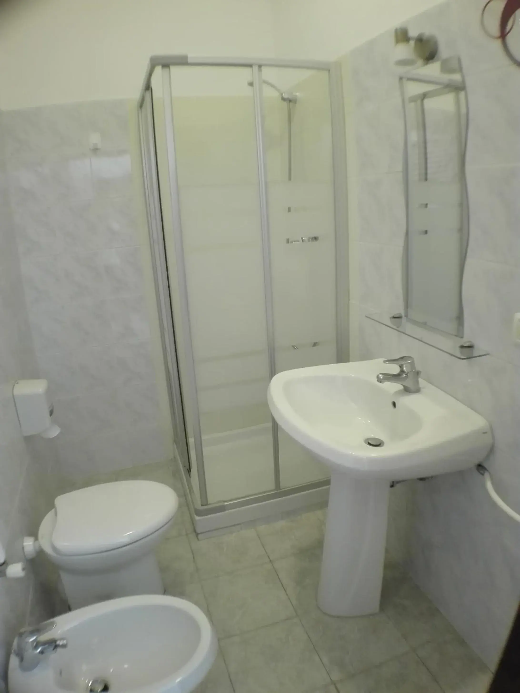 Classic Quadruple Room in Hotel Villa Cesare B&B Classic Quadruple Room in Hotel Villa Cesare B&B