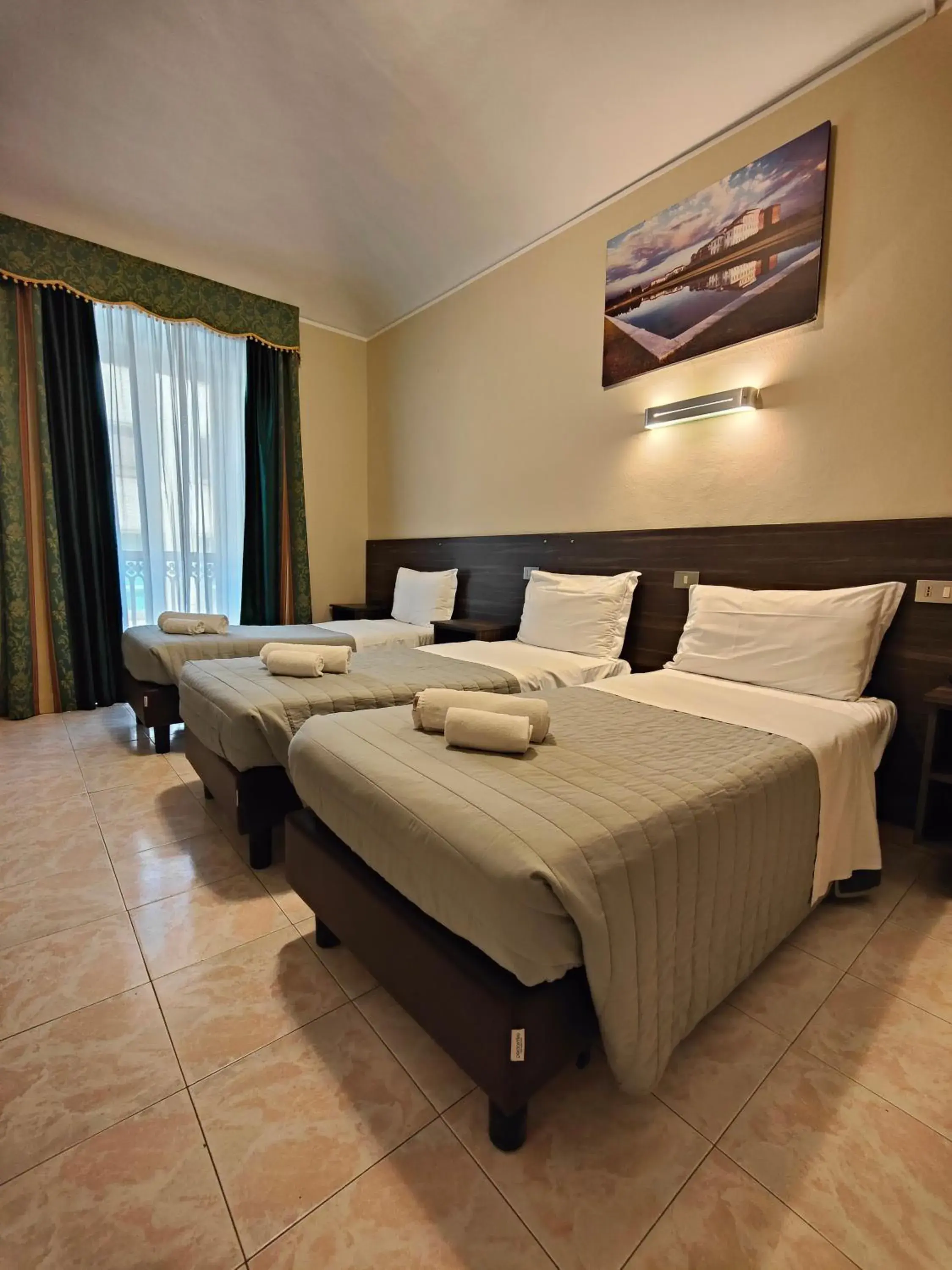 Triple Room in Hotel Romano Triple Room in Hotel Romano