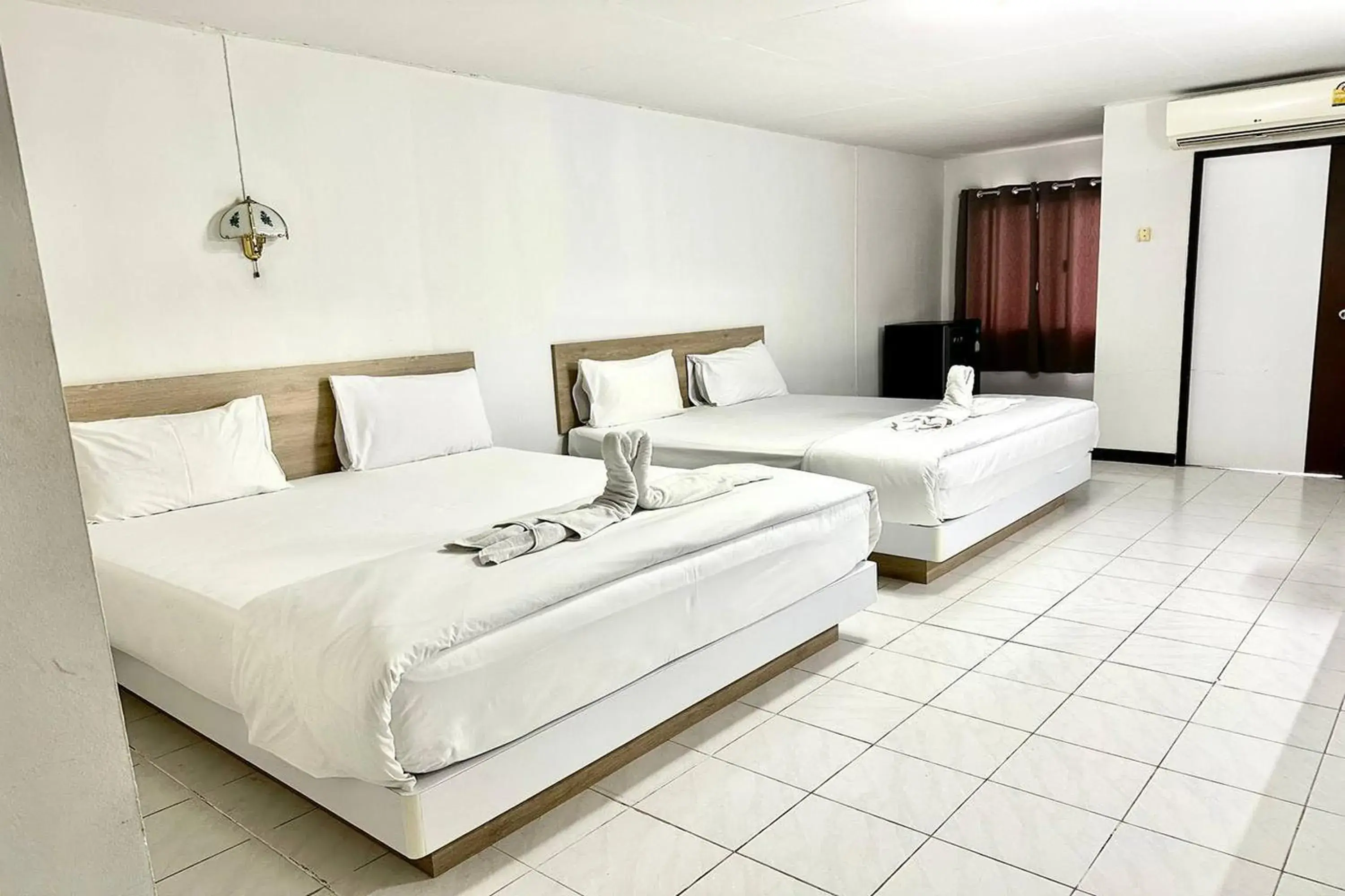 Deluxe Quadruple Room in Boonchai Mansion Deluxe Quadruple Room in Boonchai Mansion