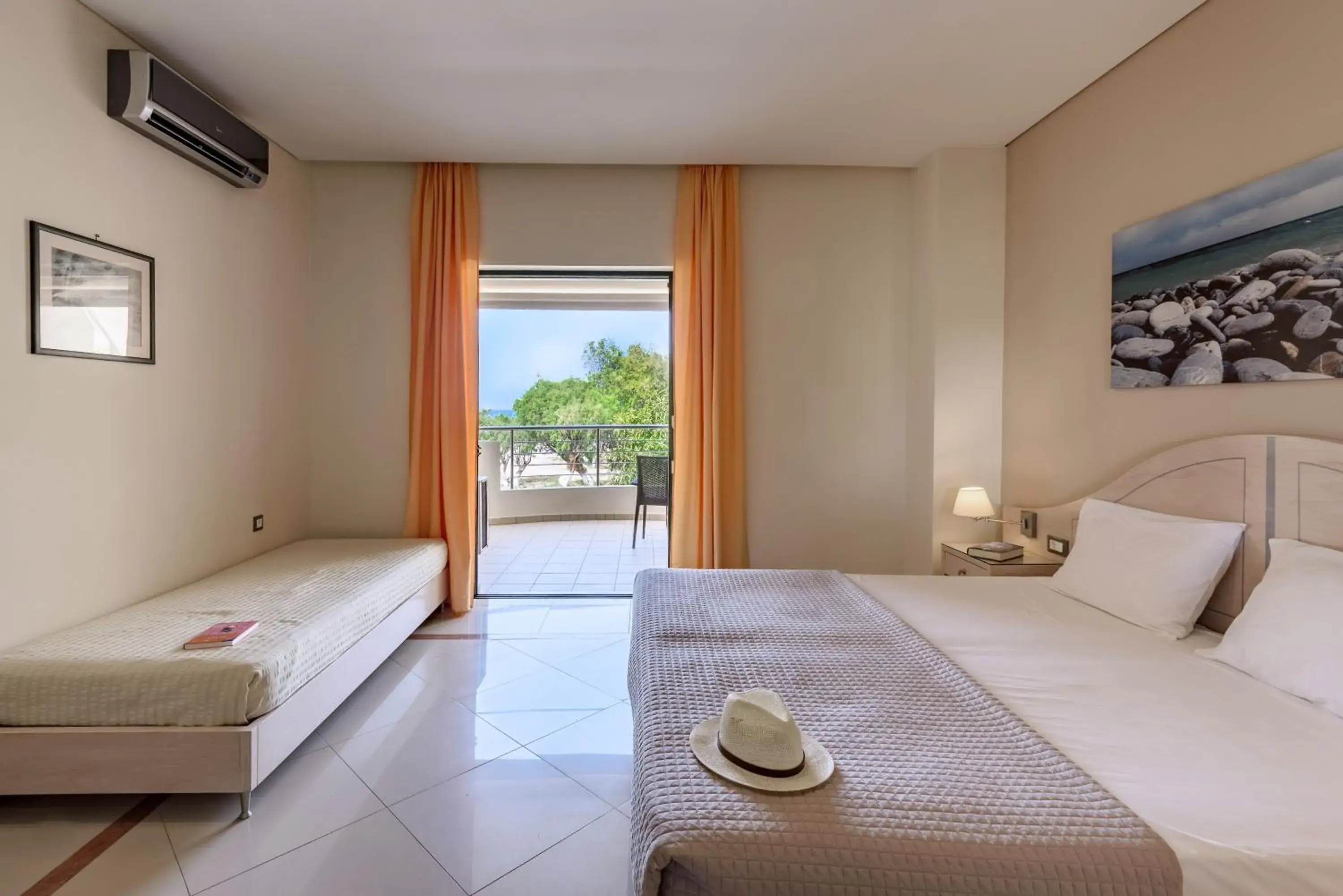 Superior Triple Room in Hotel Poseidon Superior Triple Room in Hotel Poseidon