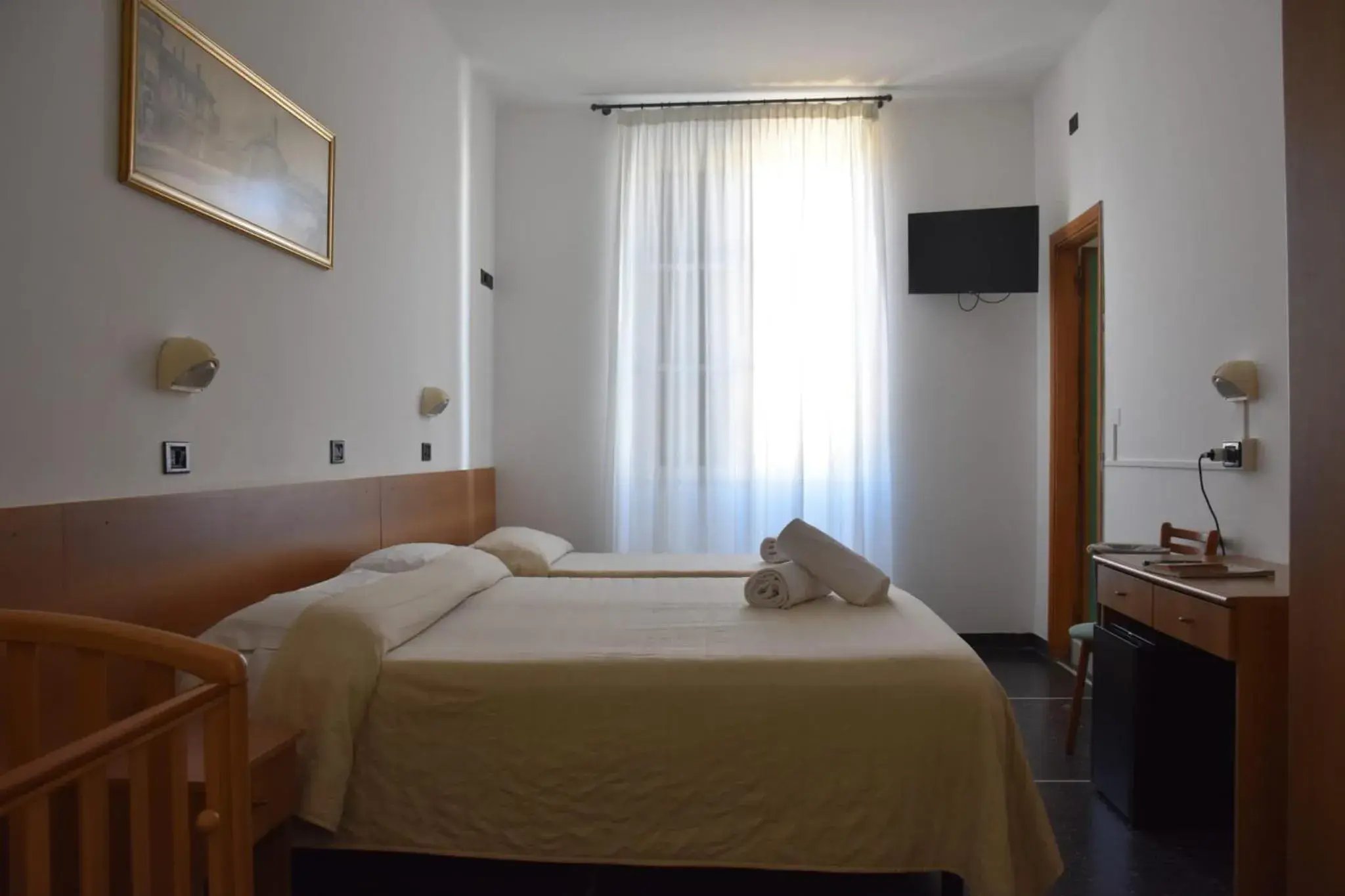 Deluxe Triple Room in Hotel Le Palme Deluxe Triple Room in Hotel Le Palme