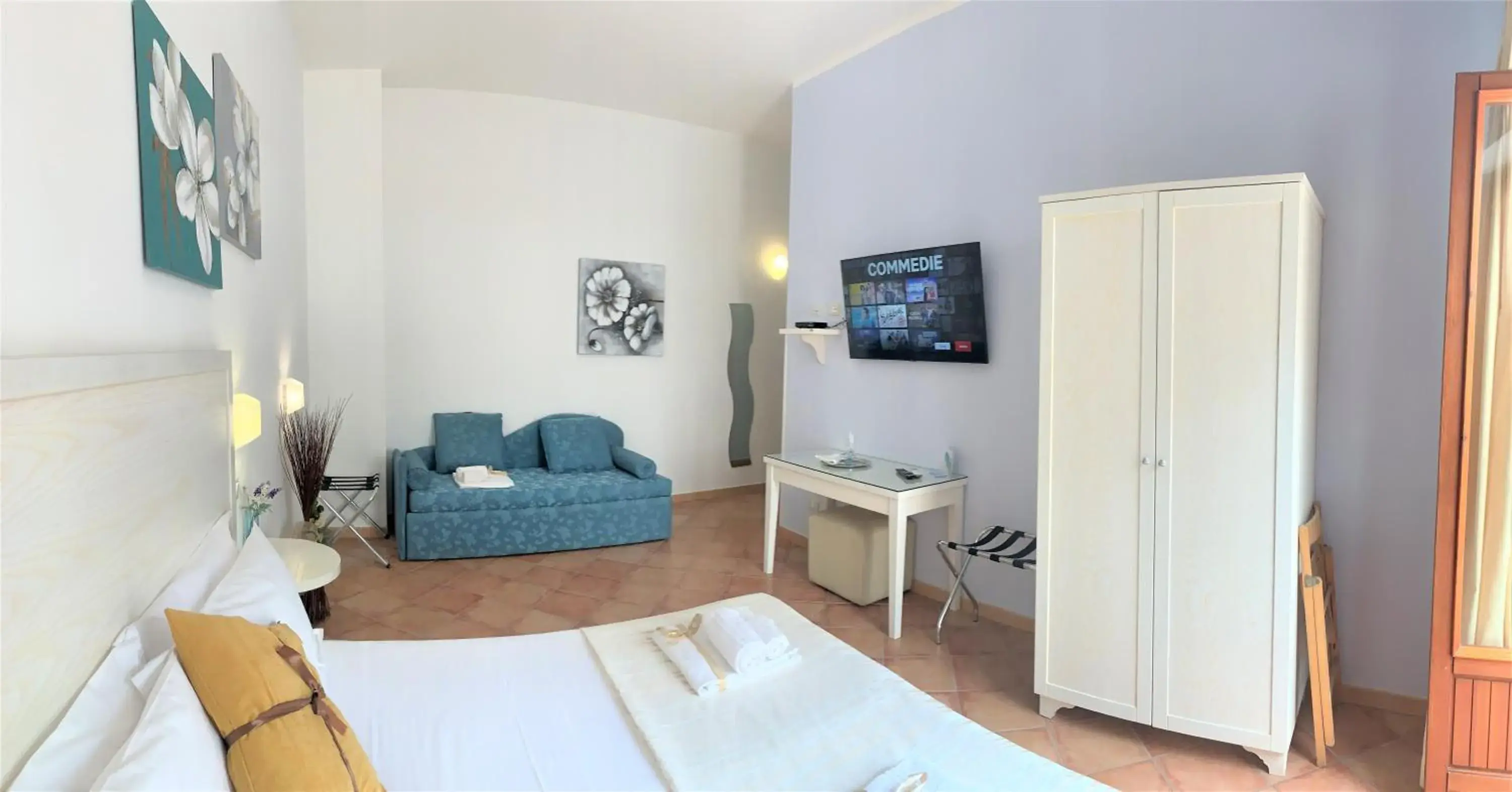 Quadruple Room with Balcony in Badia Rooms & Breakfast Quadruple Room with Balcony in Badia Rooms & Breakfast