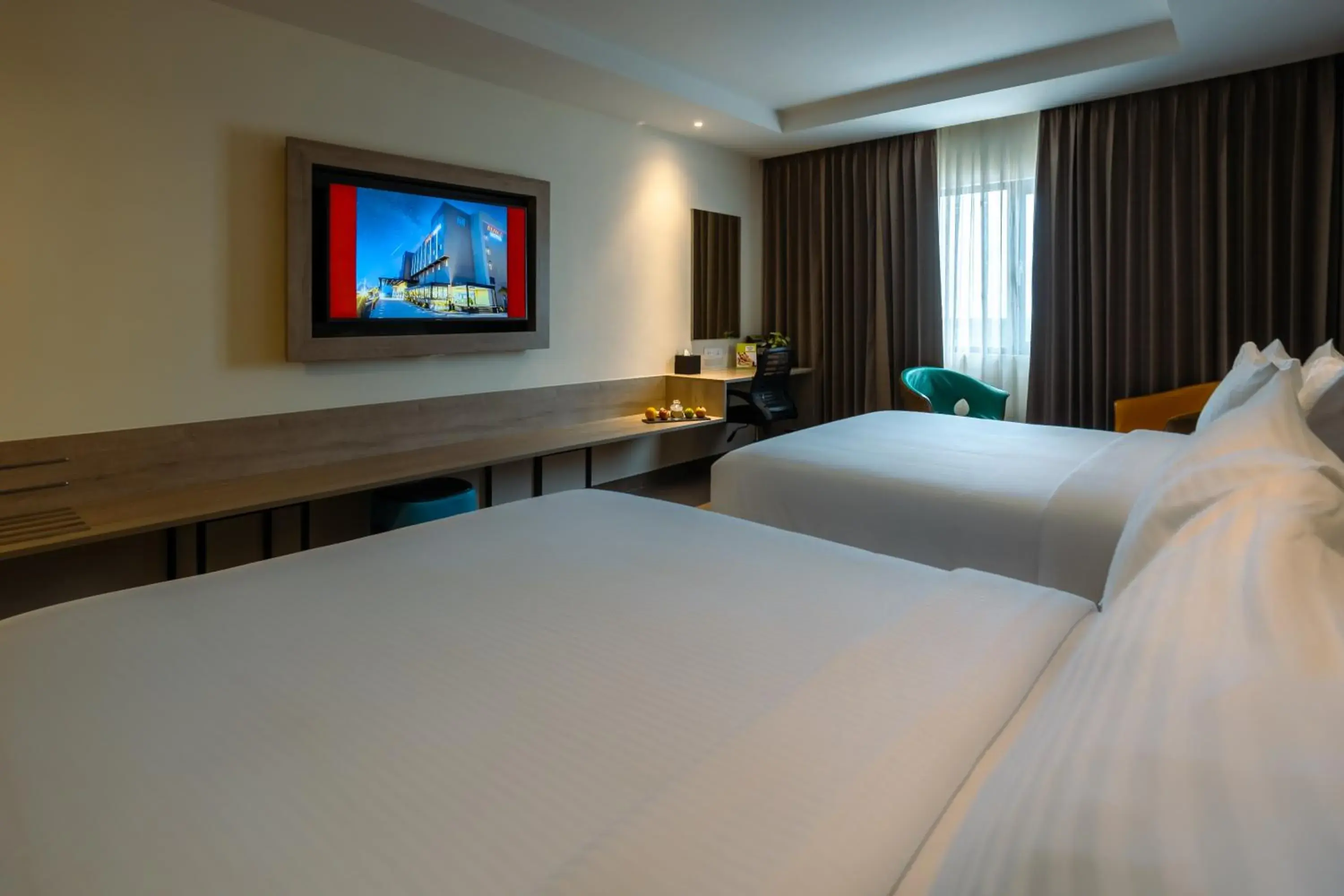 Deluxe Quadruple Room in Amika Hotel,Madurai - Near Airport Deluxe Quadruple Room in Amika Hotel,Madurai - Near Airport