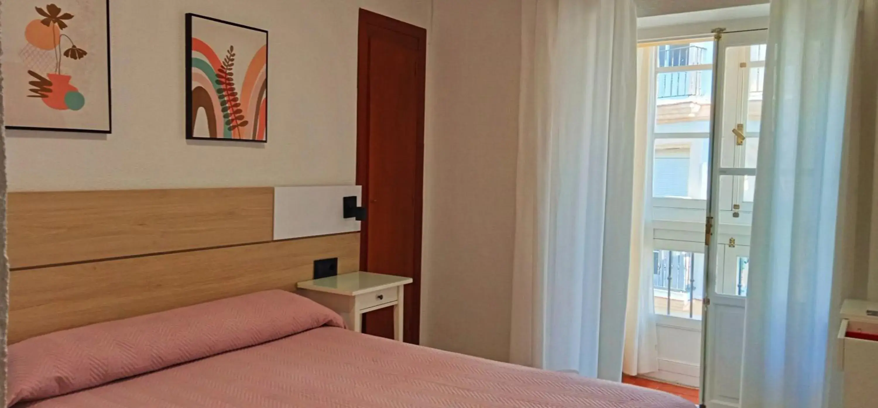 Queen Room with Balcony in Hostal Bahía Queen Room with Balcony in Hostal Bahía