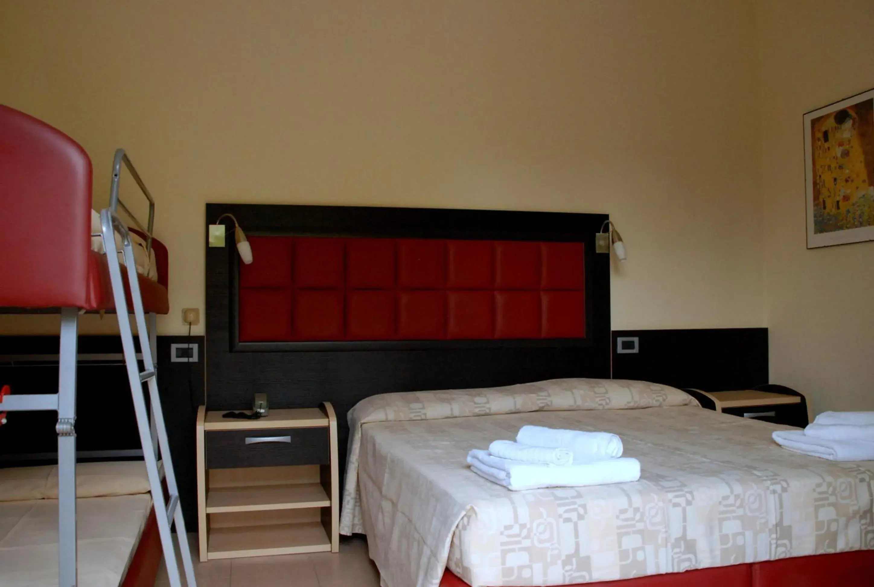 Quadruple Room with Balcony in Hotel Arno Quadruple Room with Balcony in Hotel Arno