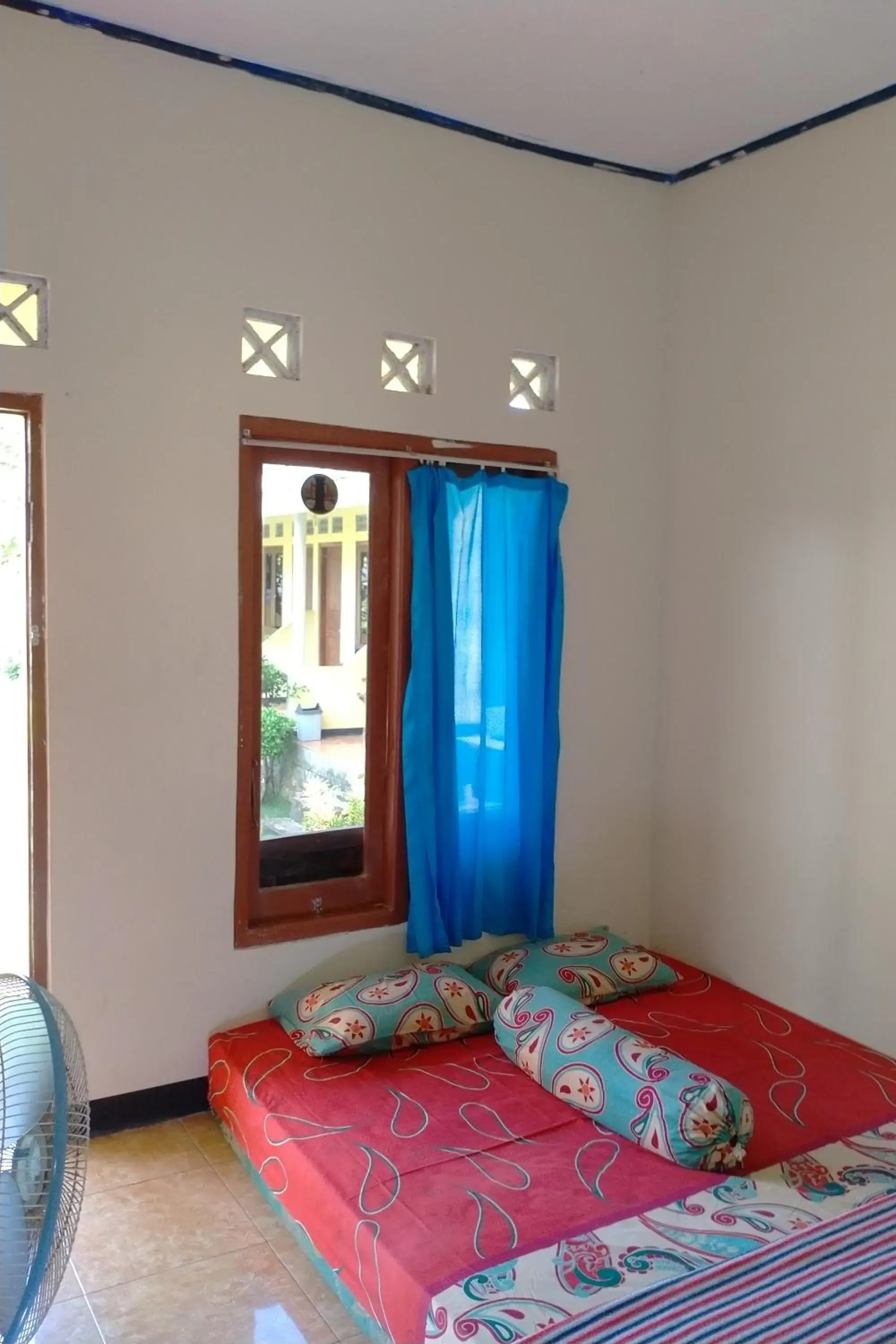 Double Room in Penginapan Putra Darma Double Room in Penginapan Putra Darma