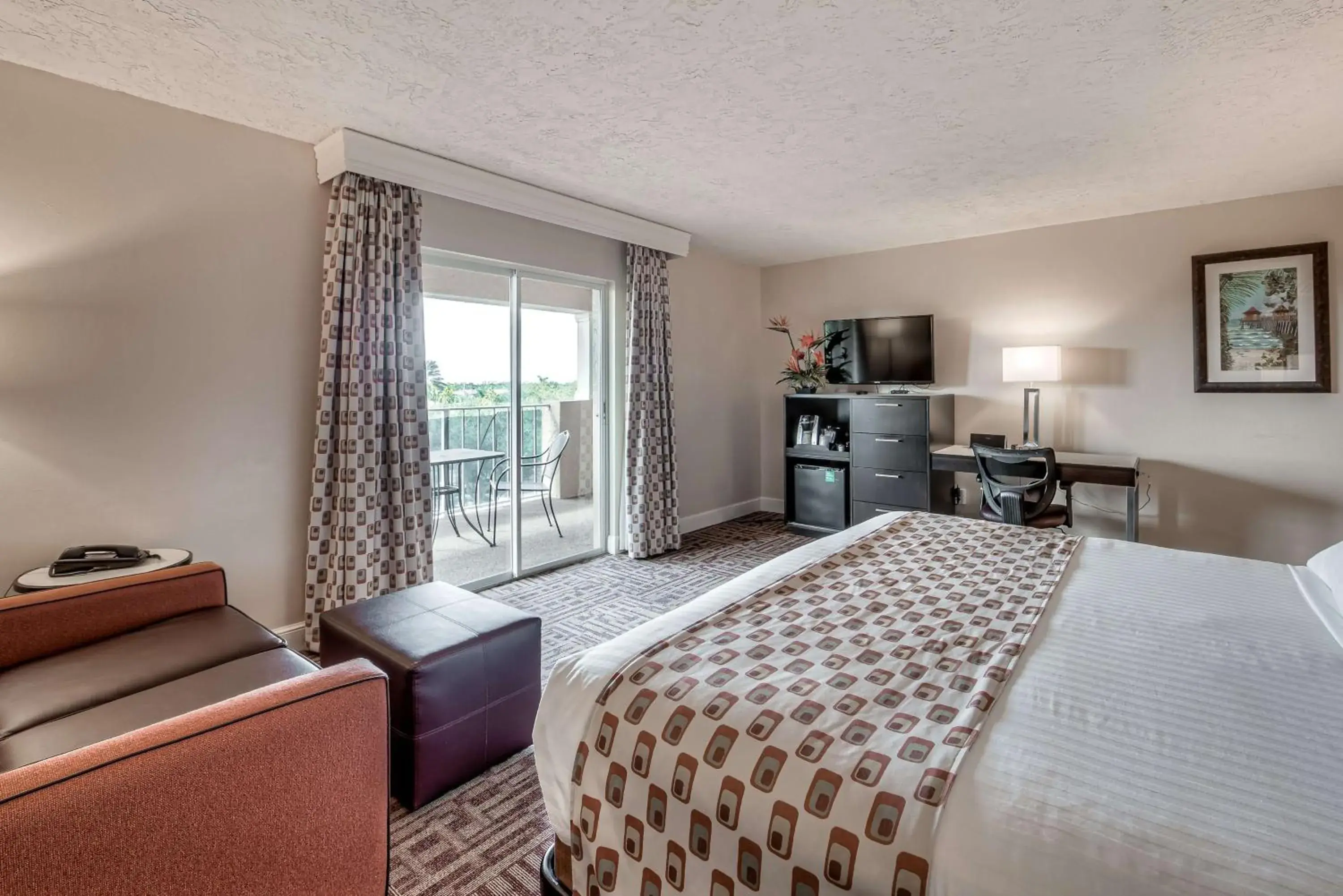 King Room with Sofa Bed and Pool View in Inn of Naples, Tapestry Collection by Hilton King Room with Sofa Bed and Pool View in Inn of Naples, Tapestry Collection by Hilton