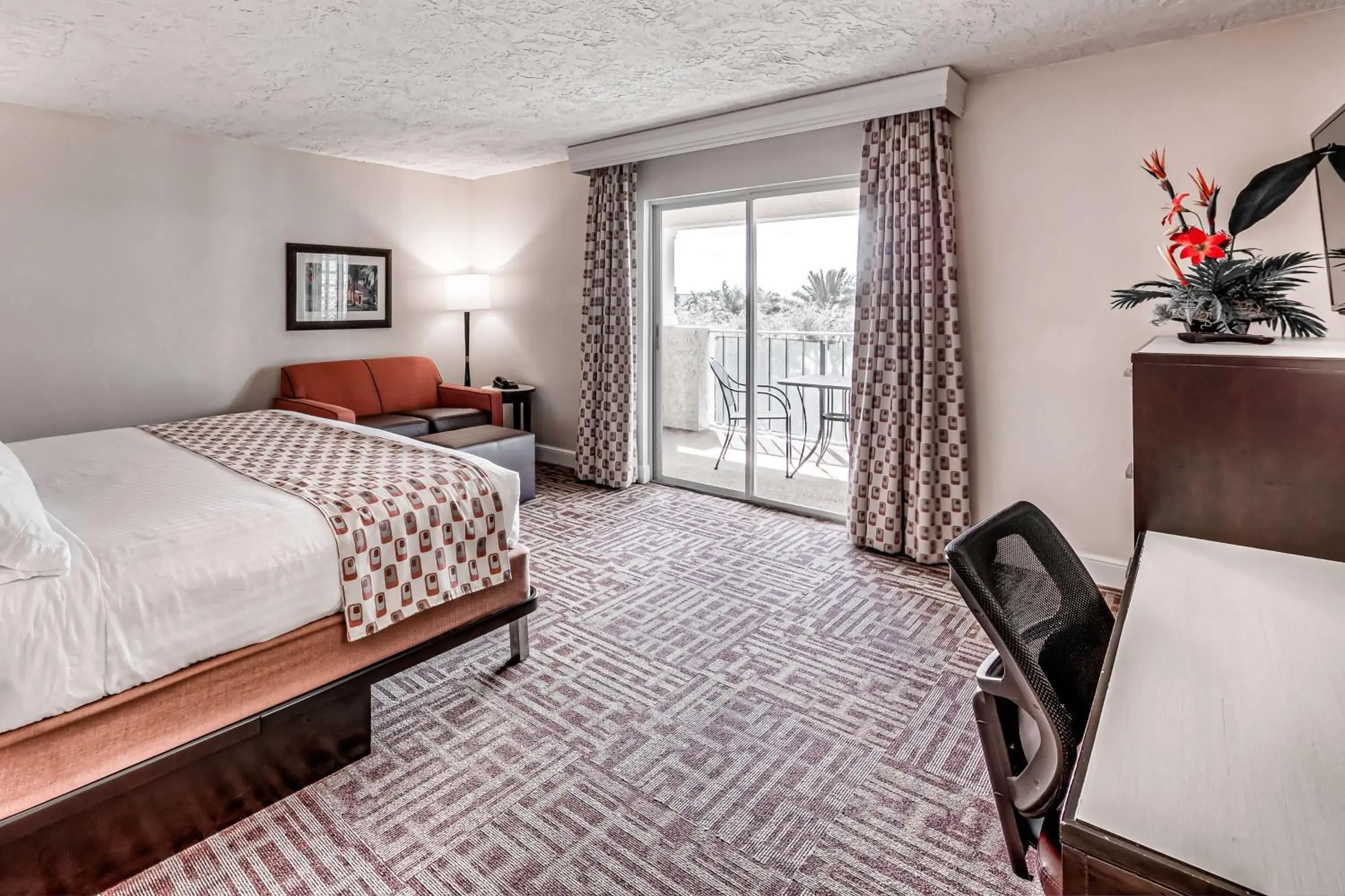 Large King Room with Balcony - Hearing Access in Inn of Naples, Tapestry Collection by Hilton Large King Room with Balcony - Hearing Access in Inn of Naples, Tapestry Collection by Hilton