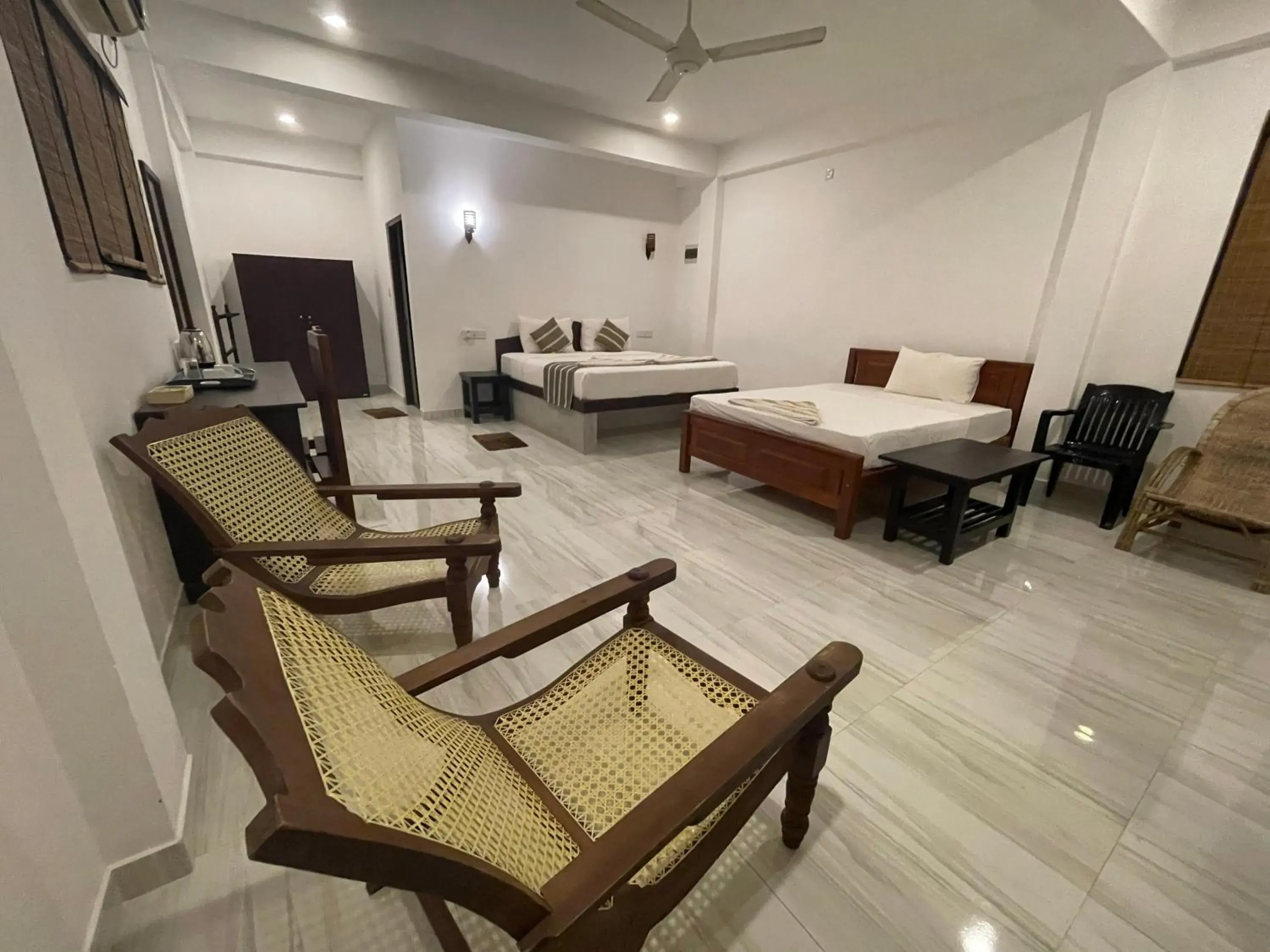 Deluxe Triple Room in Ashansa Lagoon Resort Deluxe Triple Room in Ashansa Lagoon Resort