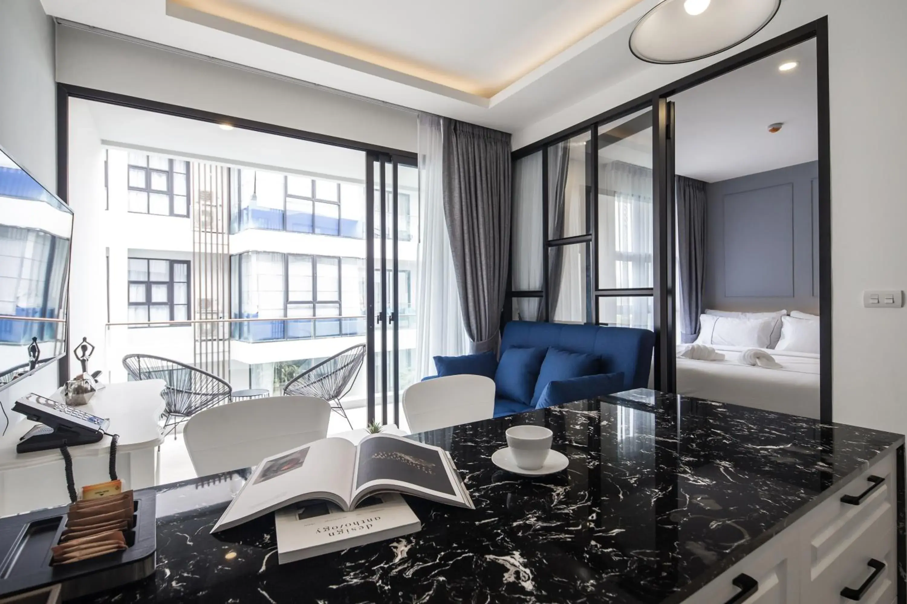 Deluxe Double or Twin Room with Pool View in Palmyrah Surin Beach Residence Deluxe Double or Twin Room with Pool View in Palmyrah Surin Beach Residence