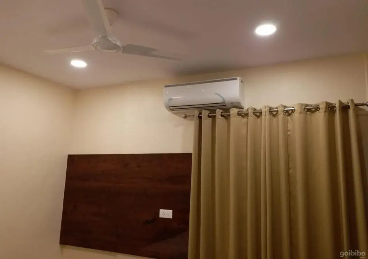 Triple Room in Ganga Darshan Triple Room in Ganga Darshan